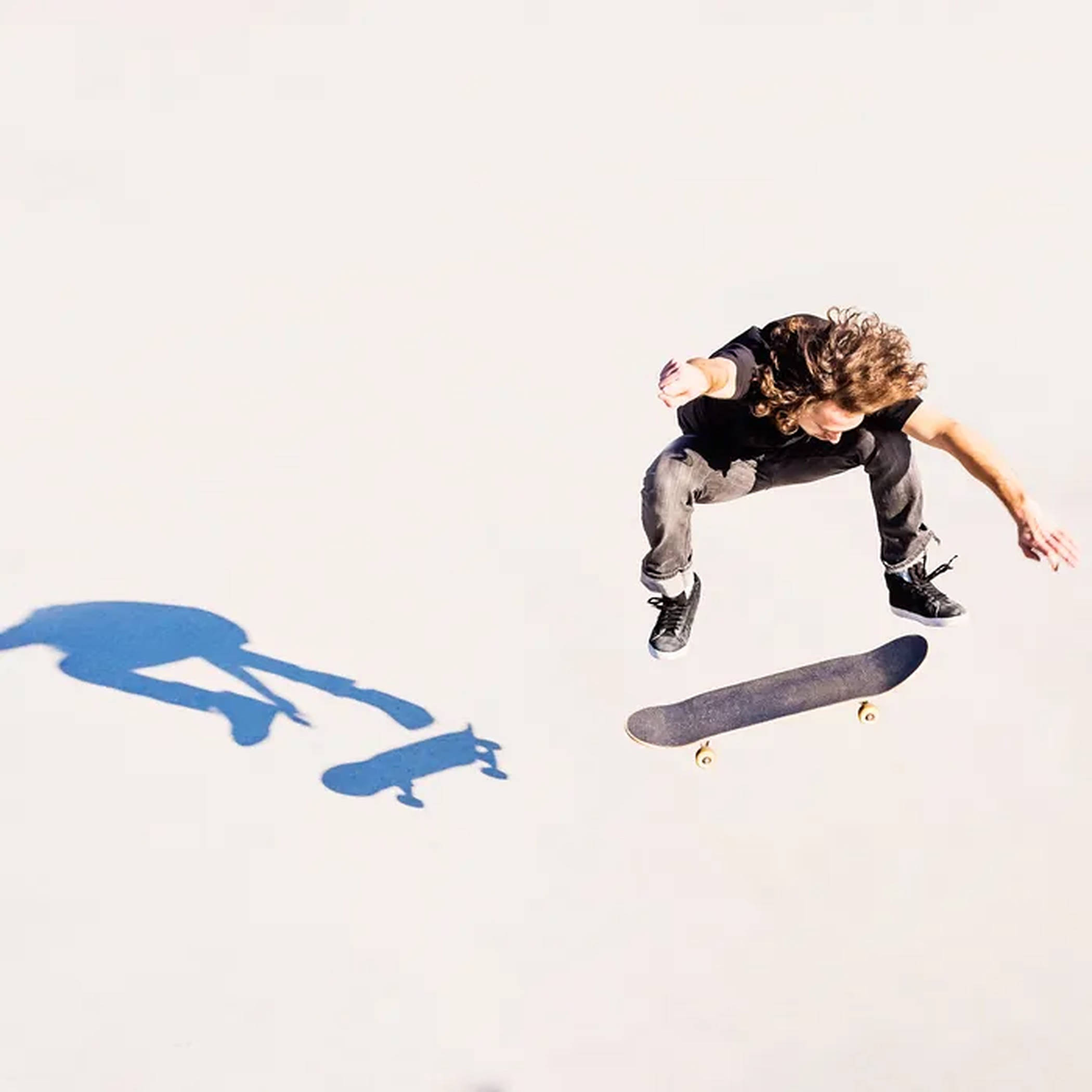 Æstetisk skygge af skateboard-dreng Wallpapers