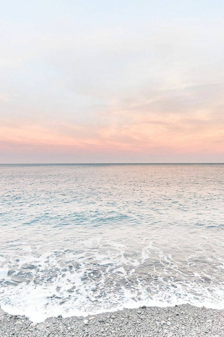 Æstetisk strand med bløde bølger Wallpapers