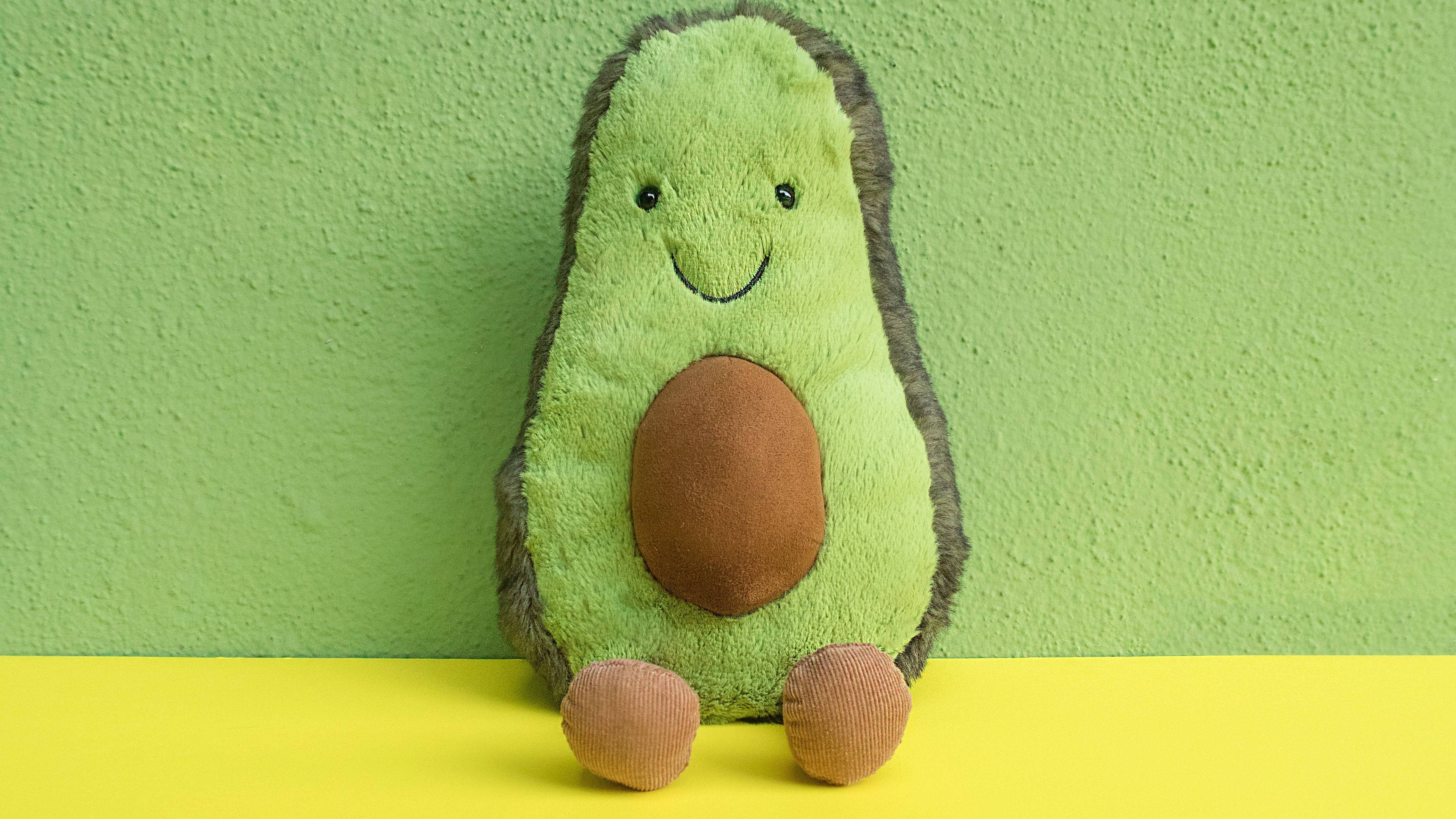 Avocado Plydsdyr på Pastelgrøn Wallpapers