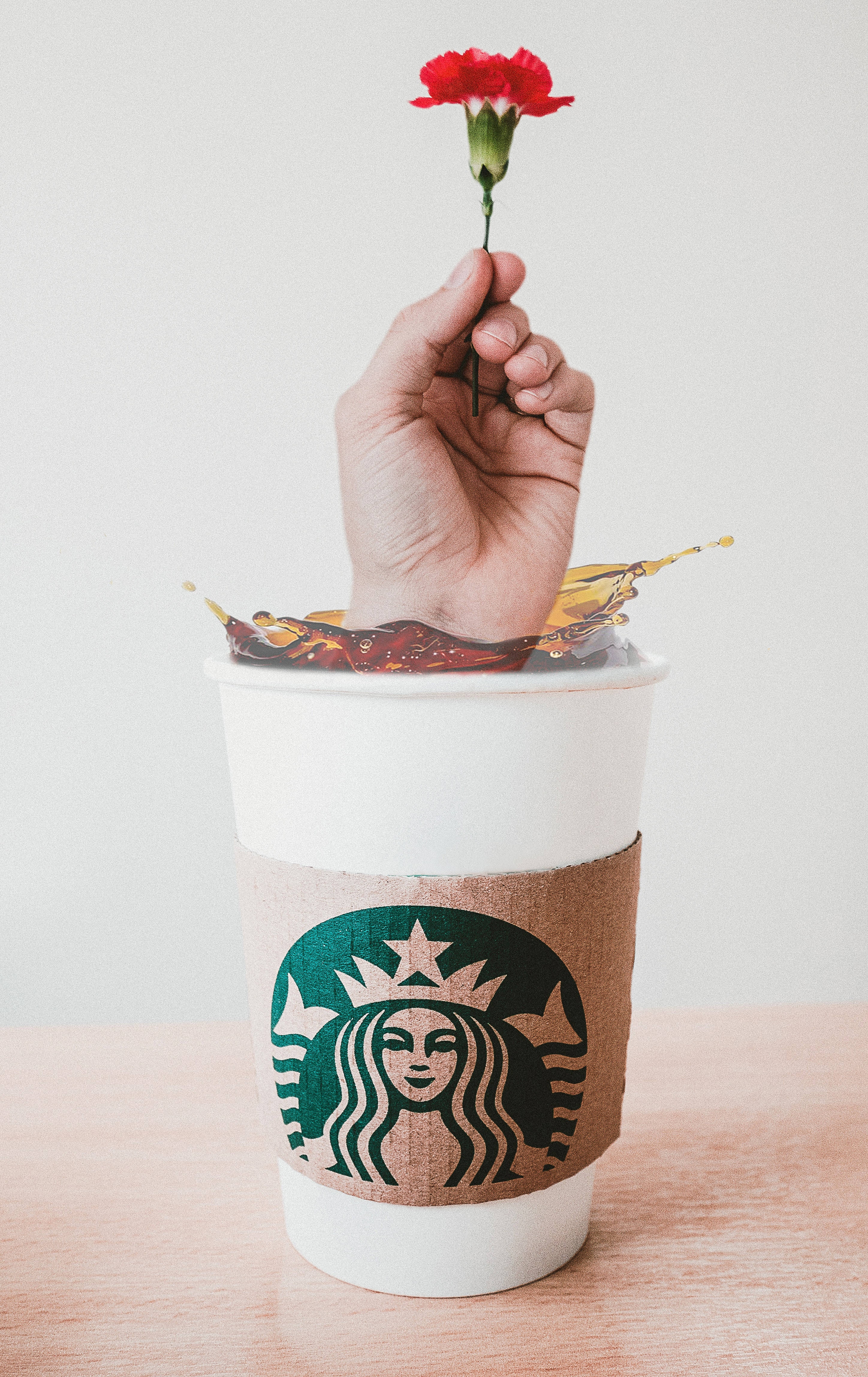 Billedtekst: Berig kaffeoplevelsen med Starbucks på iPhone Wallpapers