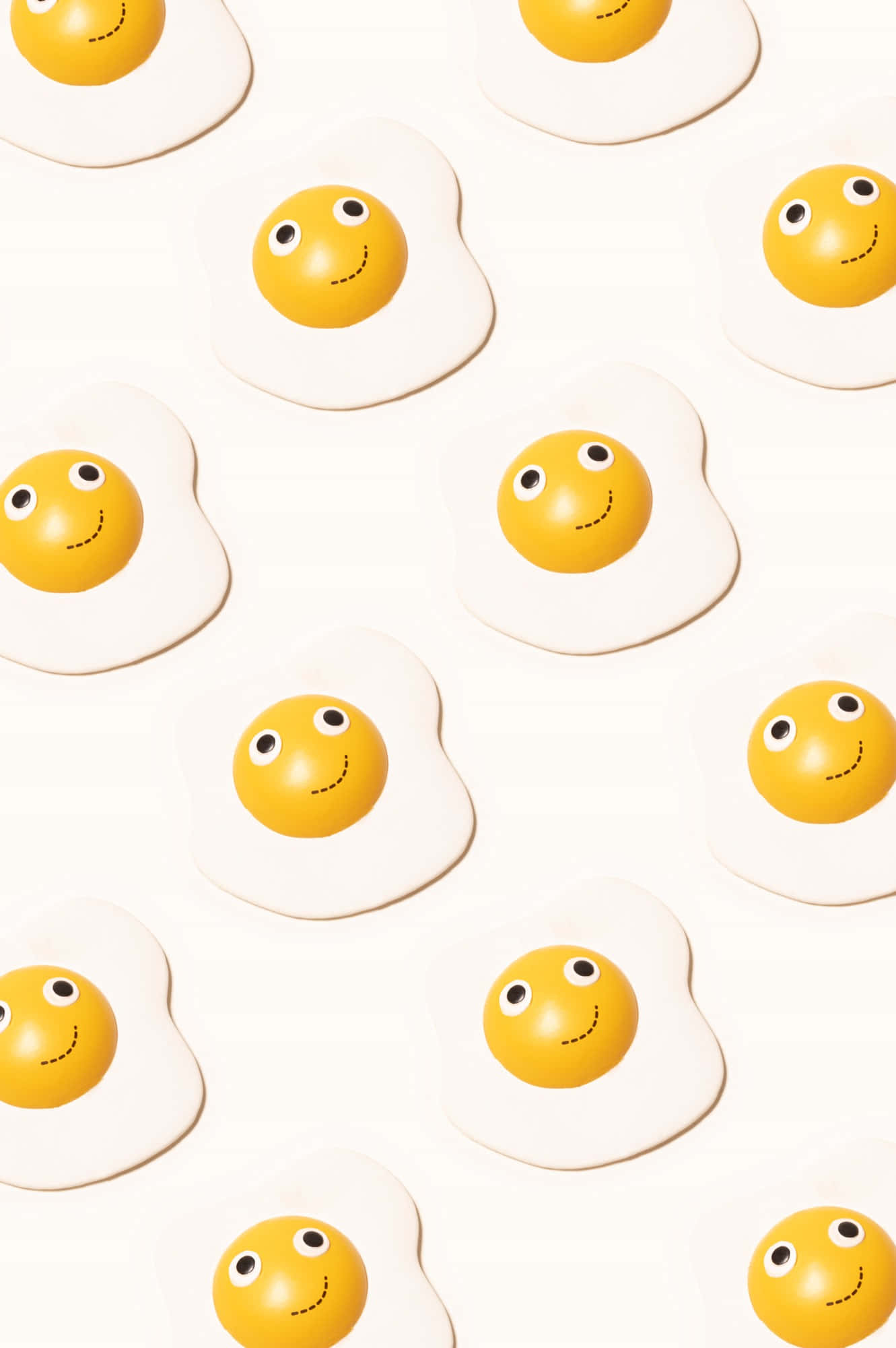 Billedtekst: En Livlig Smiley Emoji Blandet med Solæg Wallpapers