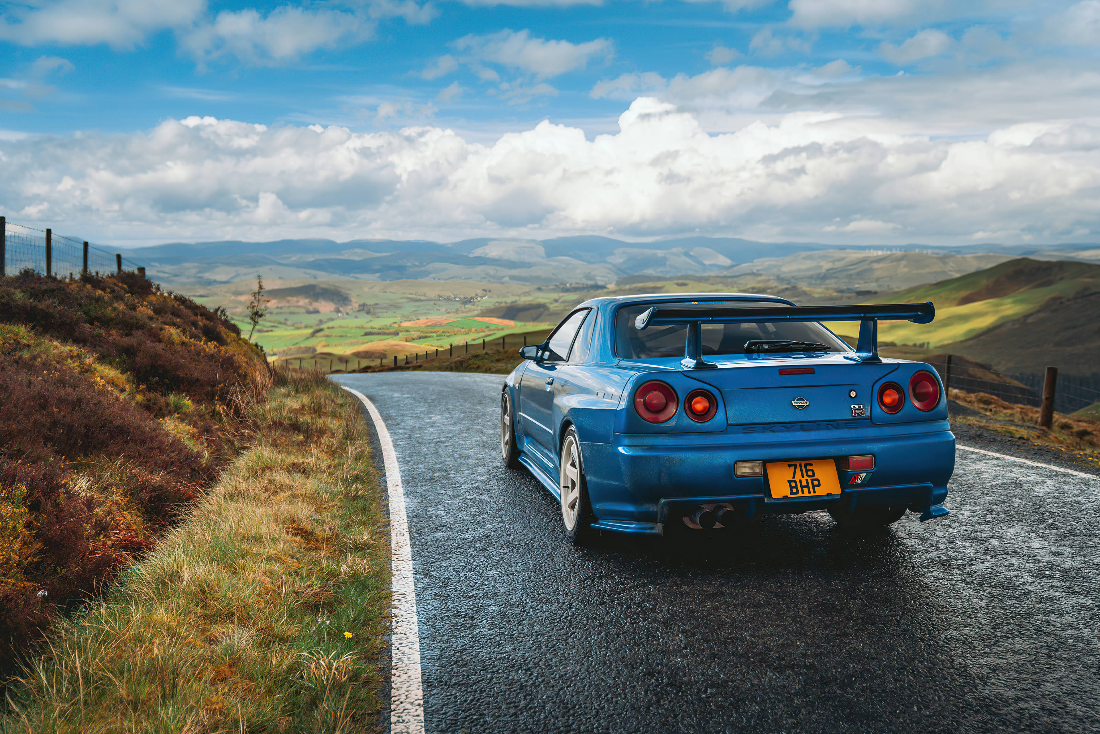 Blå Nissan Skyline GTR R34 ved bakkerne Wallpapers
