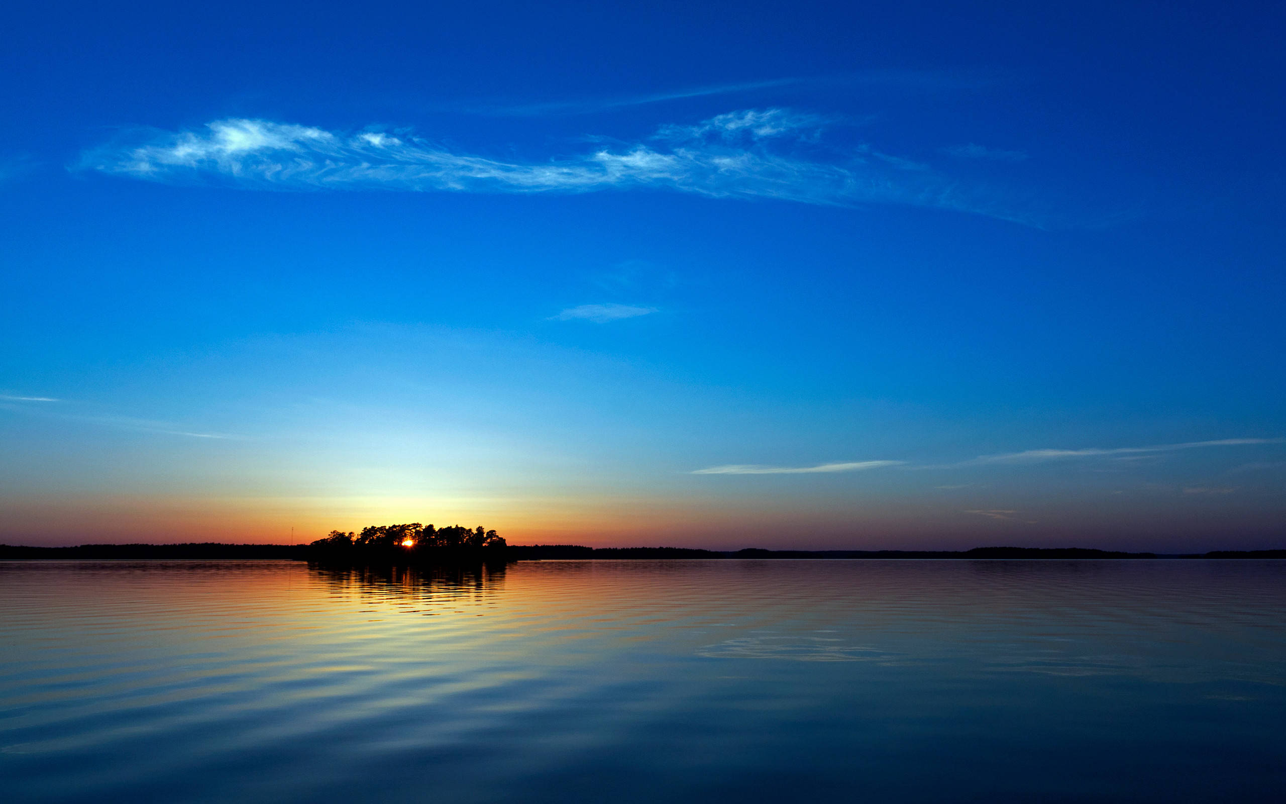 Blå solnedgang på øen skærmsparer Wallpapers