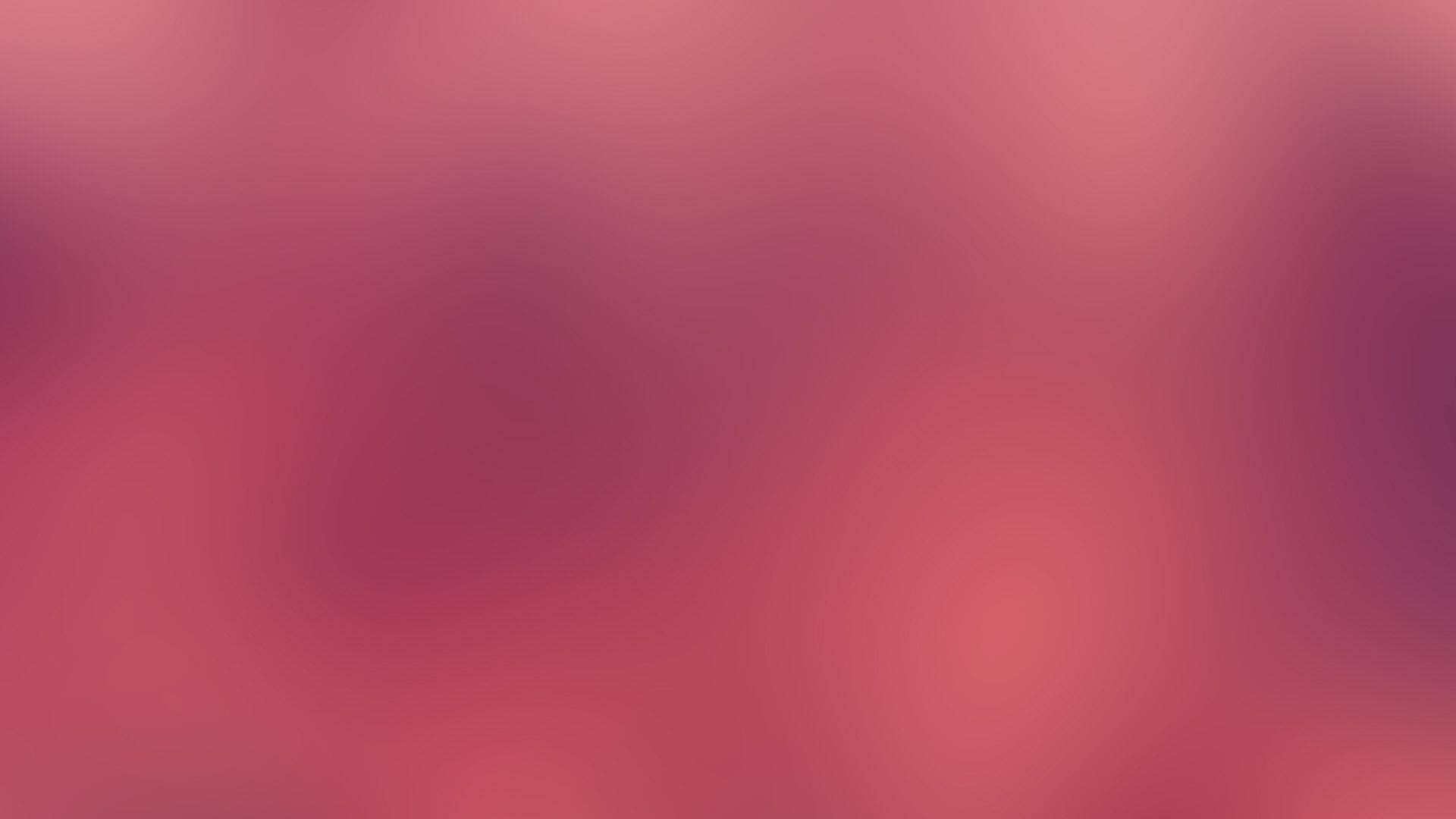 Blød pink baggrund, der udstråler varme og femininitet Wallpapers
