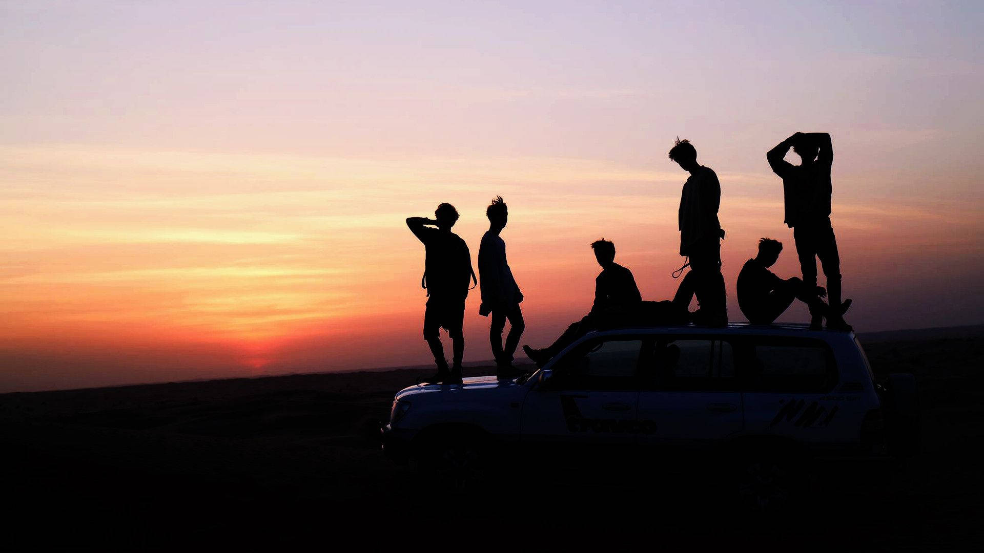 BTS-gruppebillede ved solnedgang Wallpapers