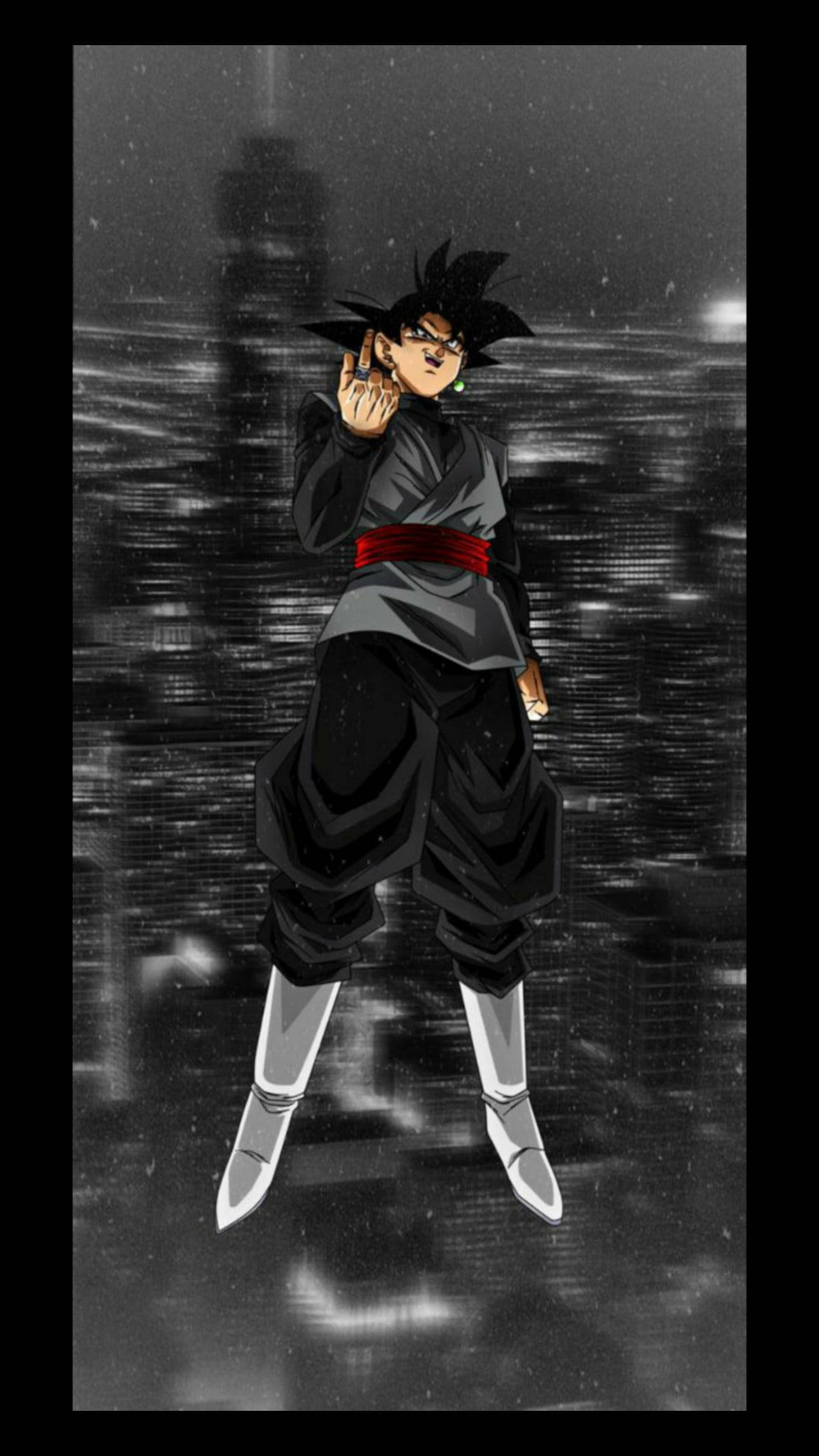 By natten svæver Goku i sort tøj over byen Wallpapers
