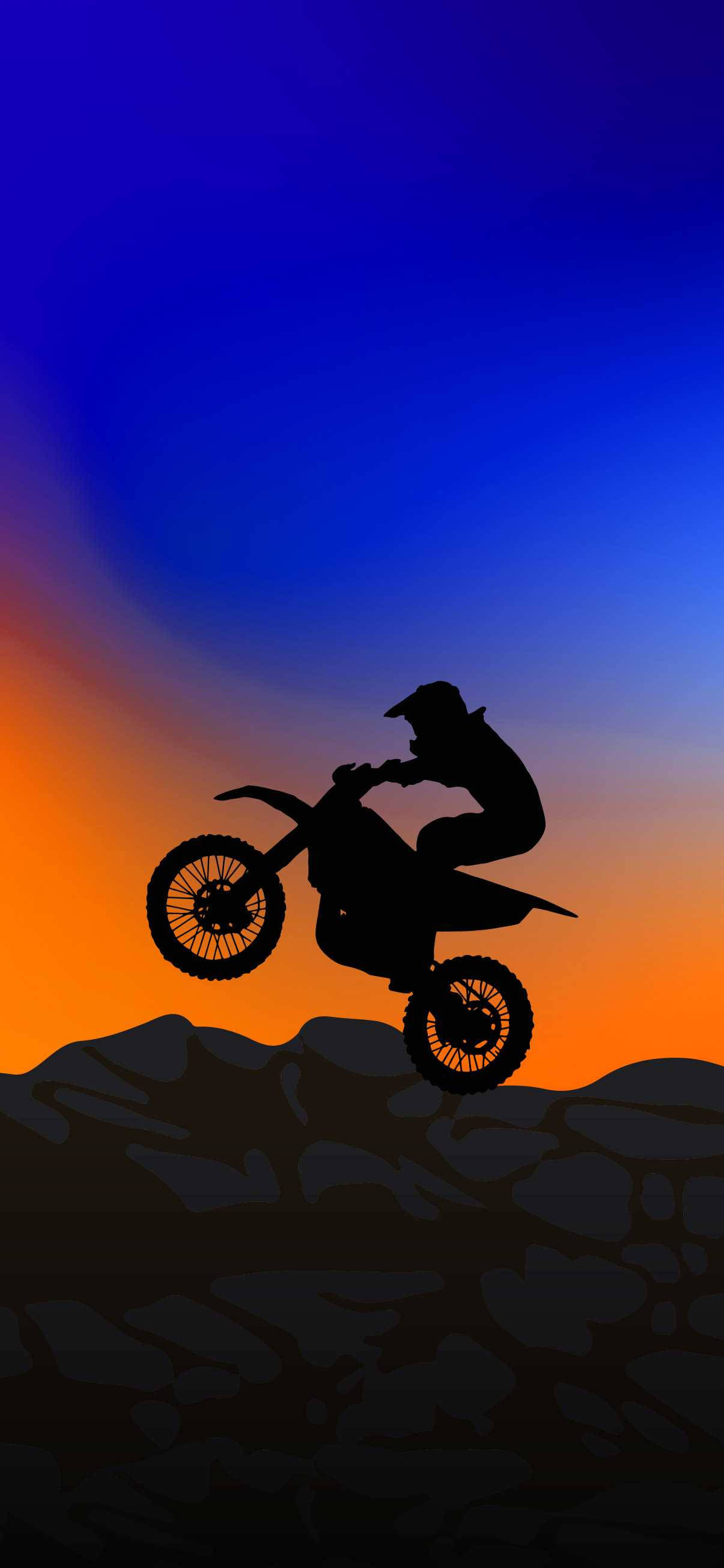 Caption: Ekstrem spænding - Dirtbike-silhuet tager flugt ved solnedgang Wallpapers