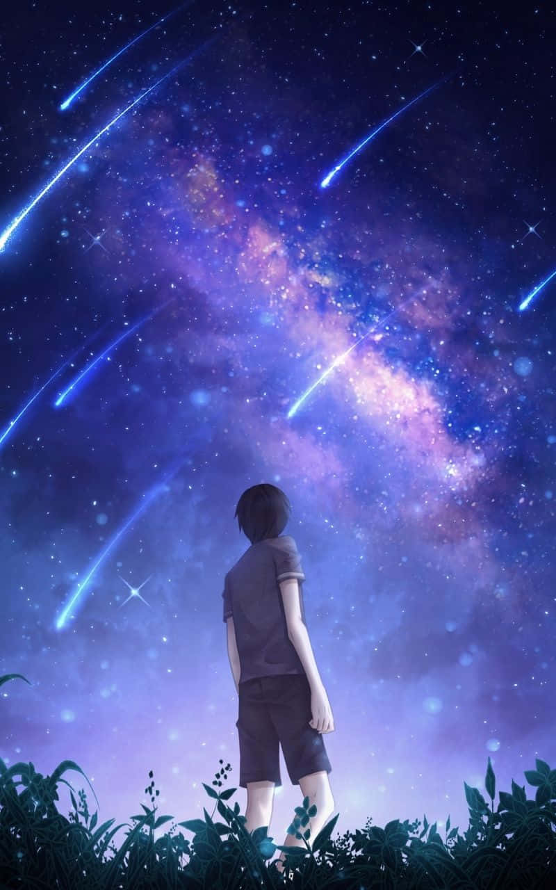 Dreng kigger op mod nattehimlen i anime-stil Wallpapers