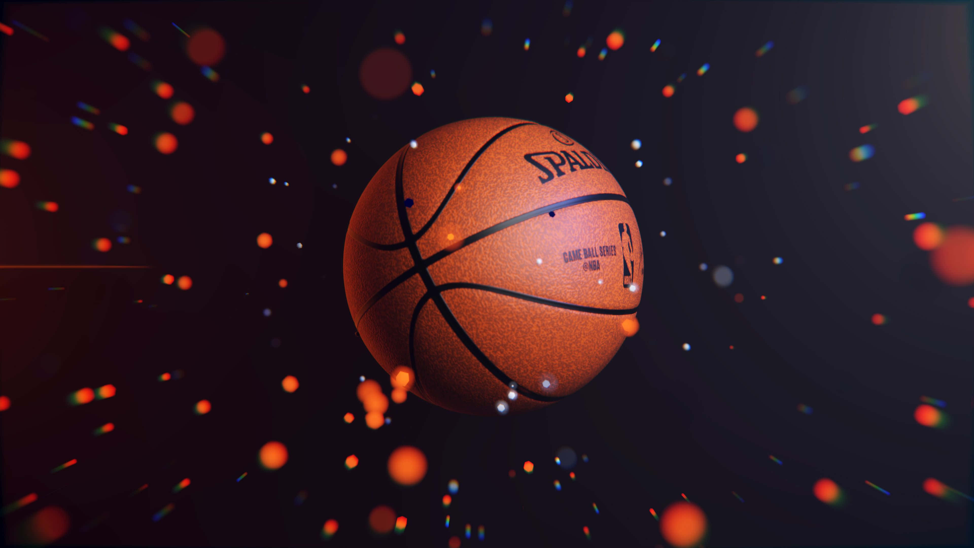 En basketball med orange og røde lys Wallpapers