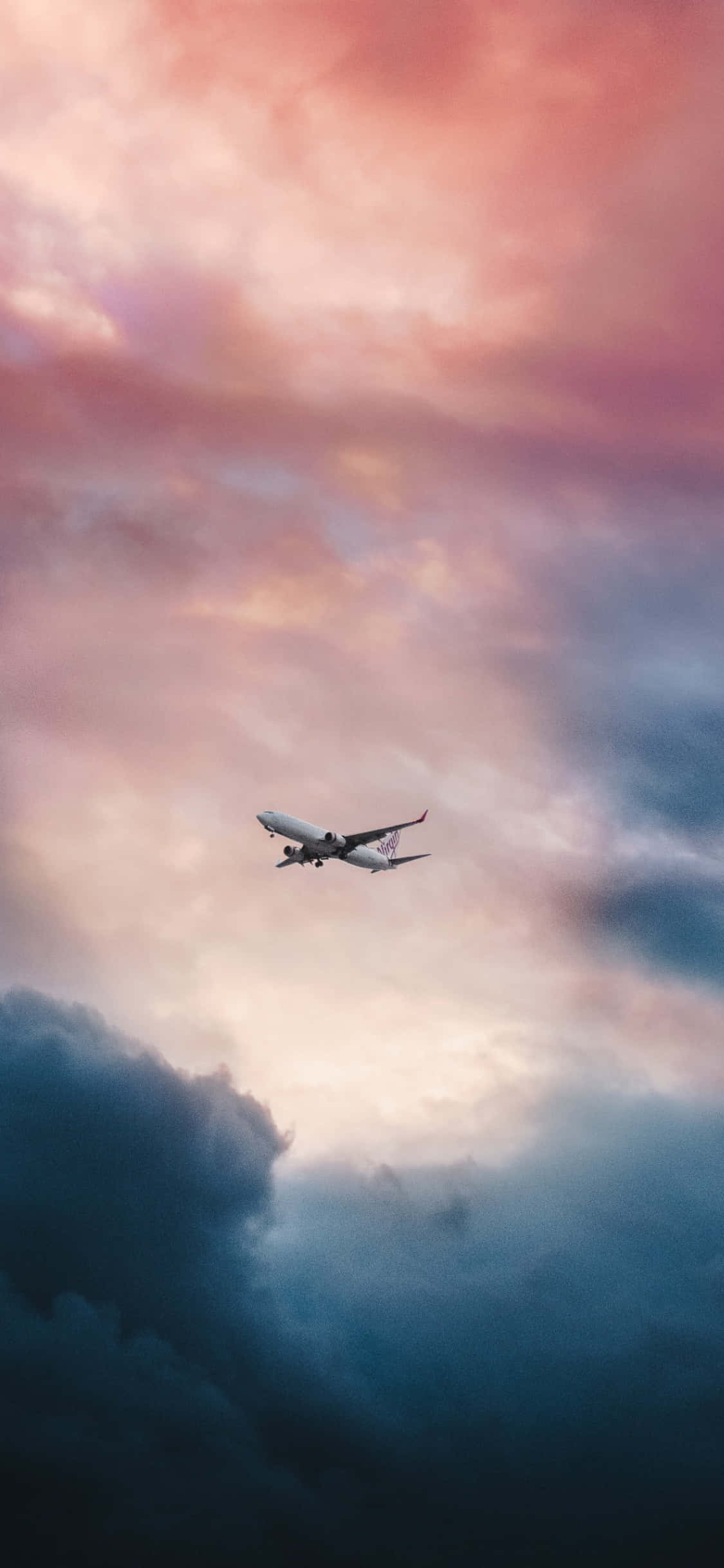 En betagende udsigt over solnedgangen over et lille fly. Wallpapers