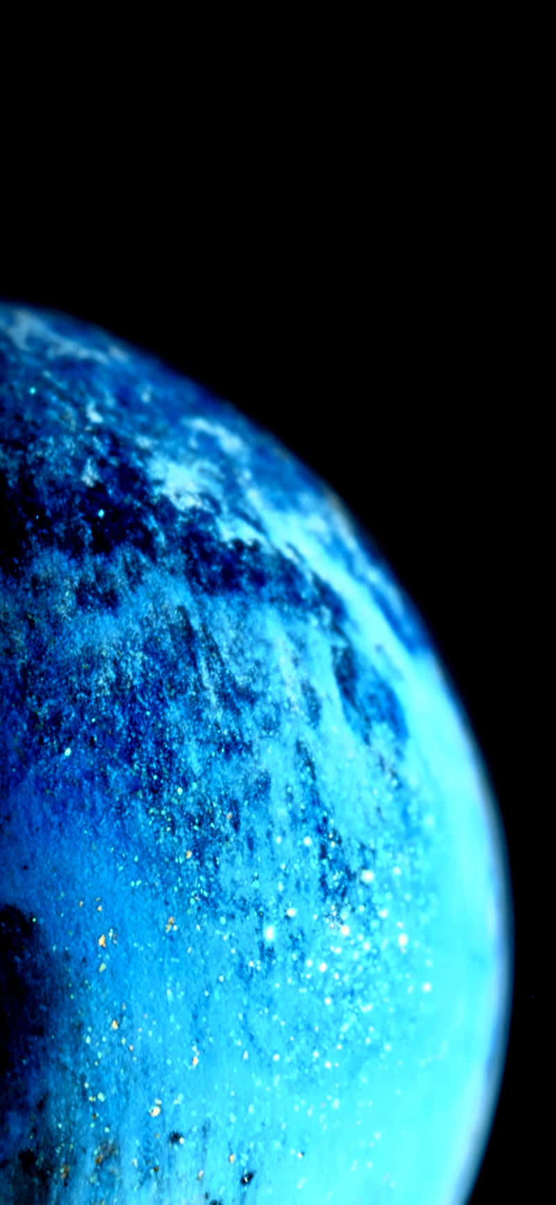 en blå planet med en sort baggrund Wallpapers