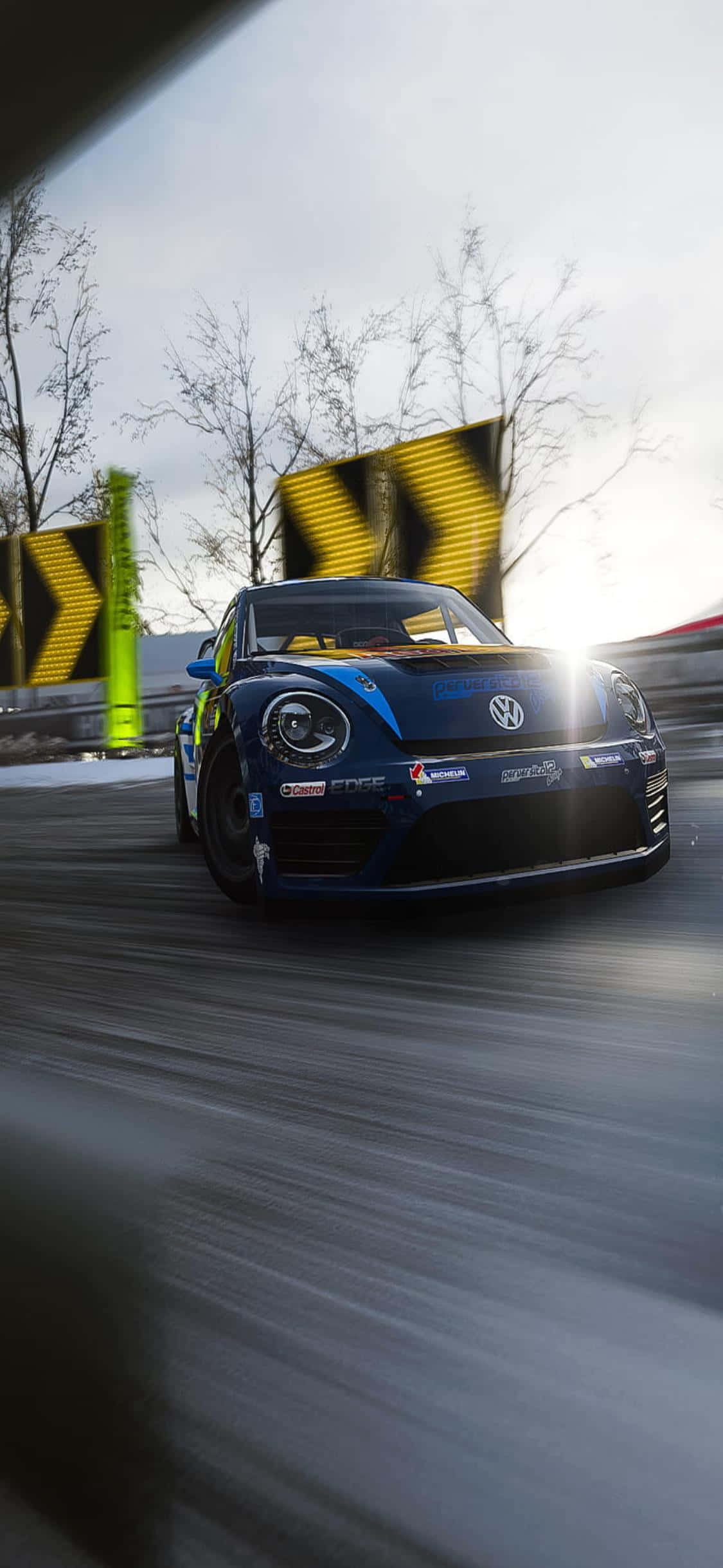 en blå volkswagen beetle kører ned ad en snedækket vej Wallpapers