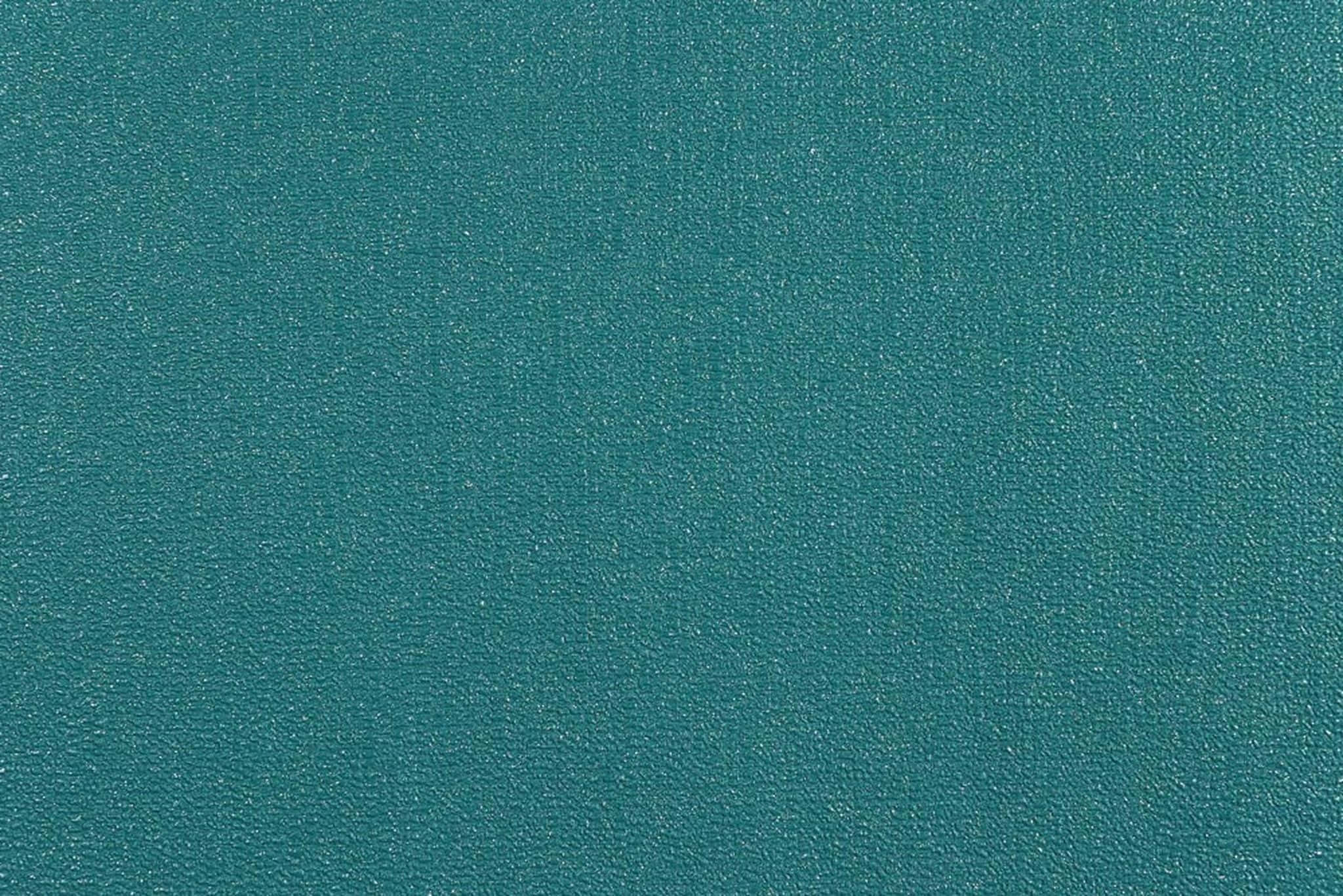 En dyb smaragdgrøn baggrund, perfekt til elegante projekter Wallpapers