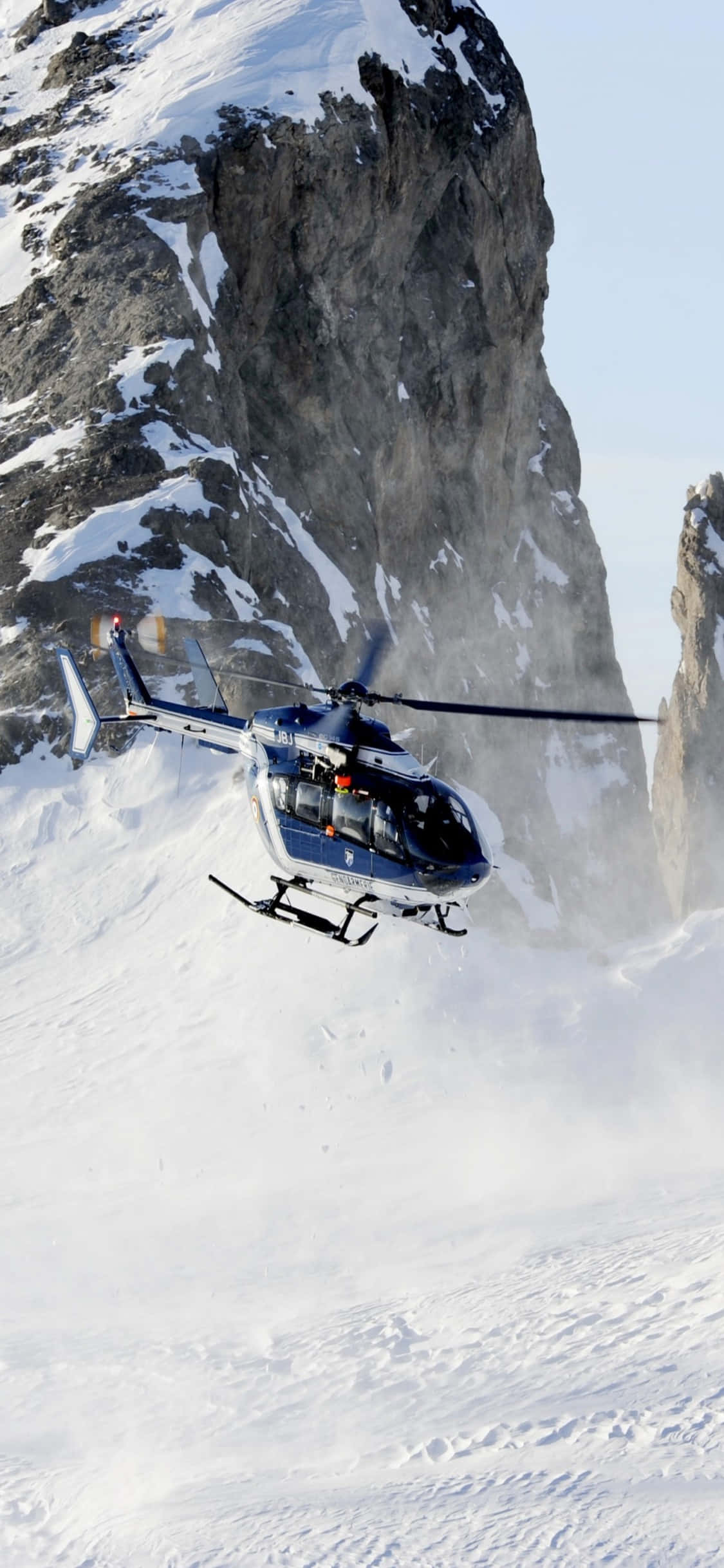 En fantastisk udsigt over helikoptere over et smukt landskab, fanget på en iPhone Xs Wallpapers