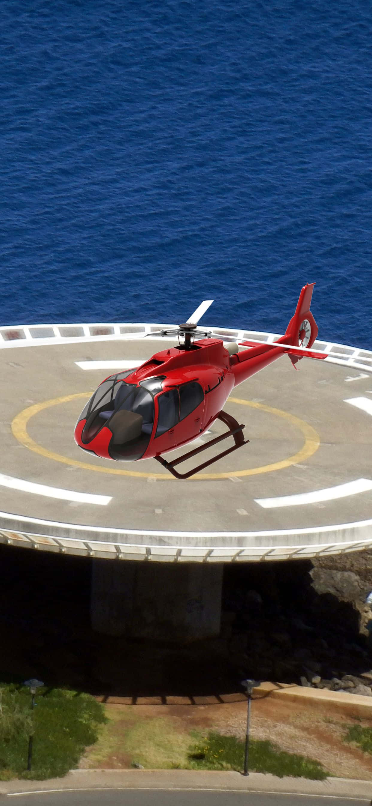 en helikopter flyver over havet Wallpapers