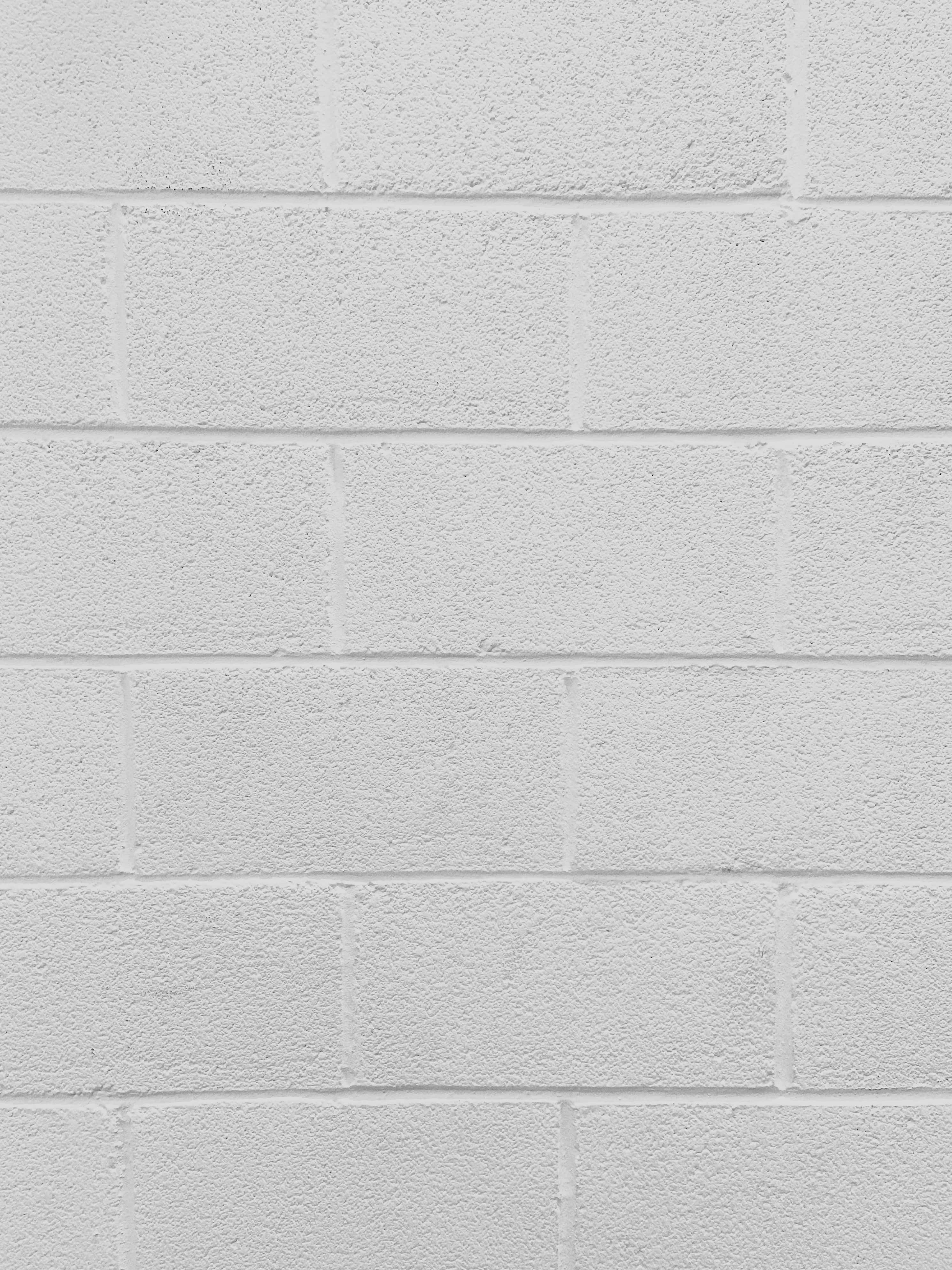 en hvid murstensvæg med en hvid murstensstruktur Wallpapers