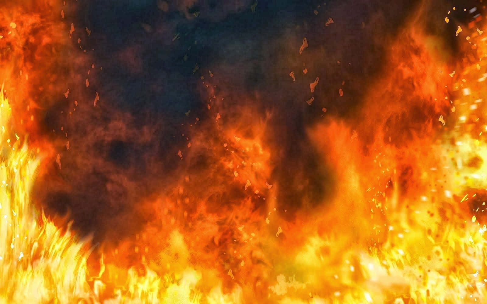 en ild med flammer på en sort baggrund Wallpapers