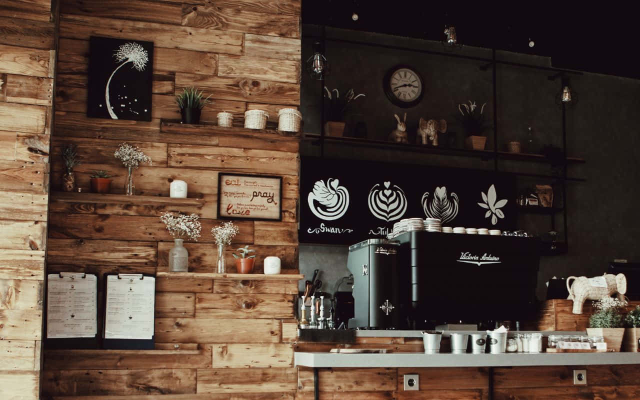 en kaffebar med trævægge og en trædisk Wallpapers