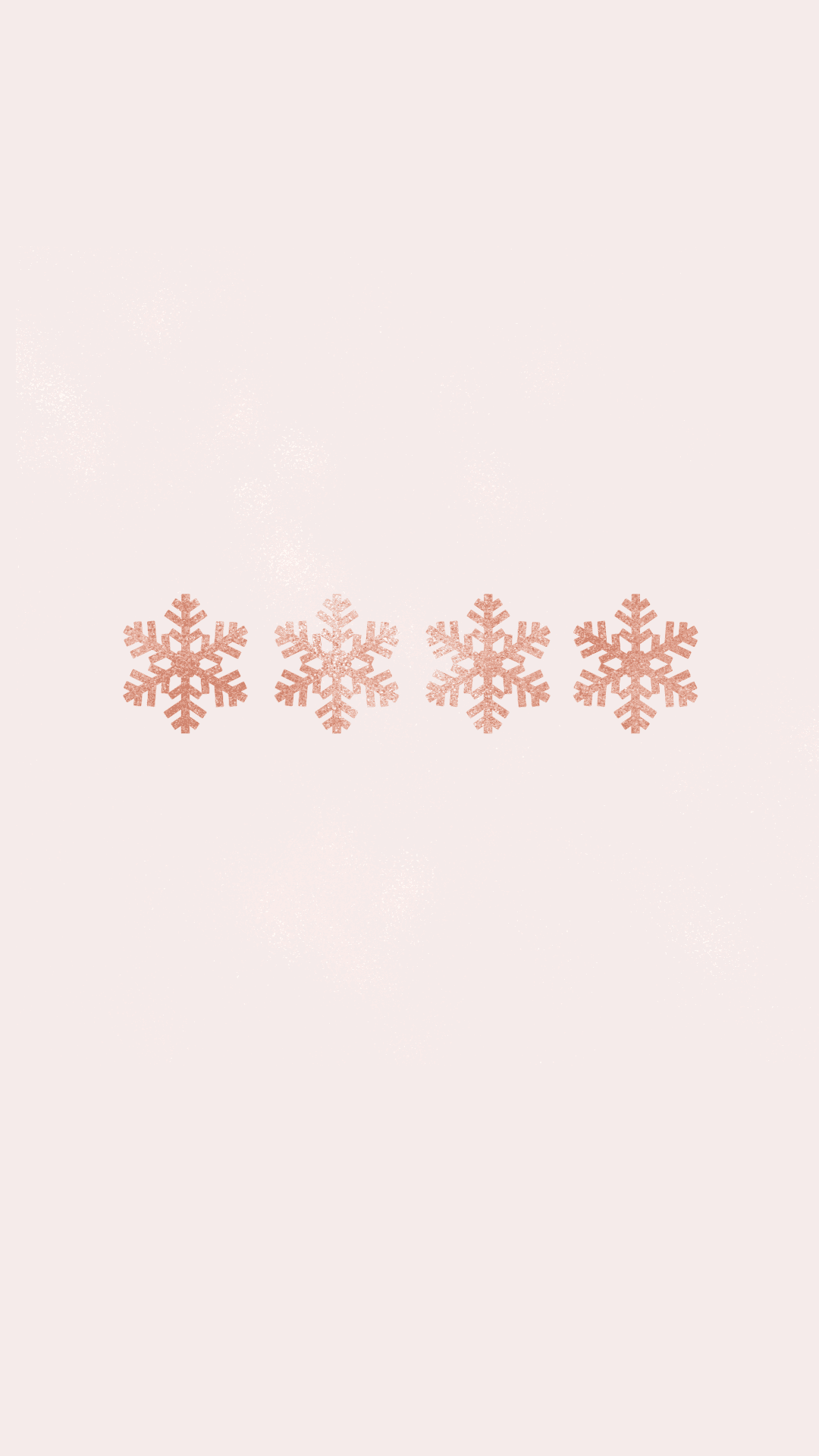en lyserød baggrund med snefnug på Wallpapers