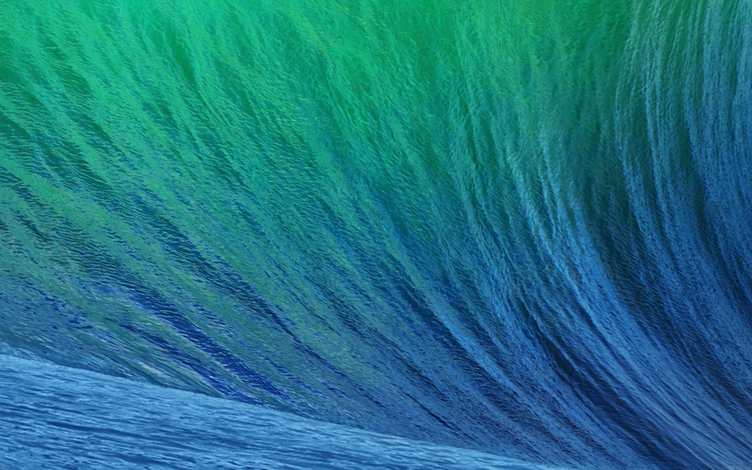En MacBook Air i en karakteristisk akvafarve Wallpapers