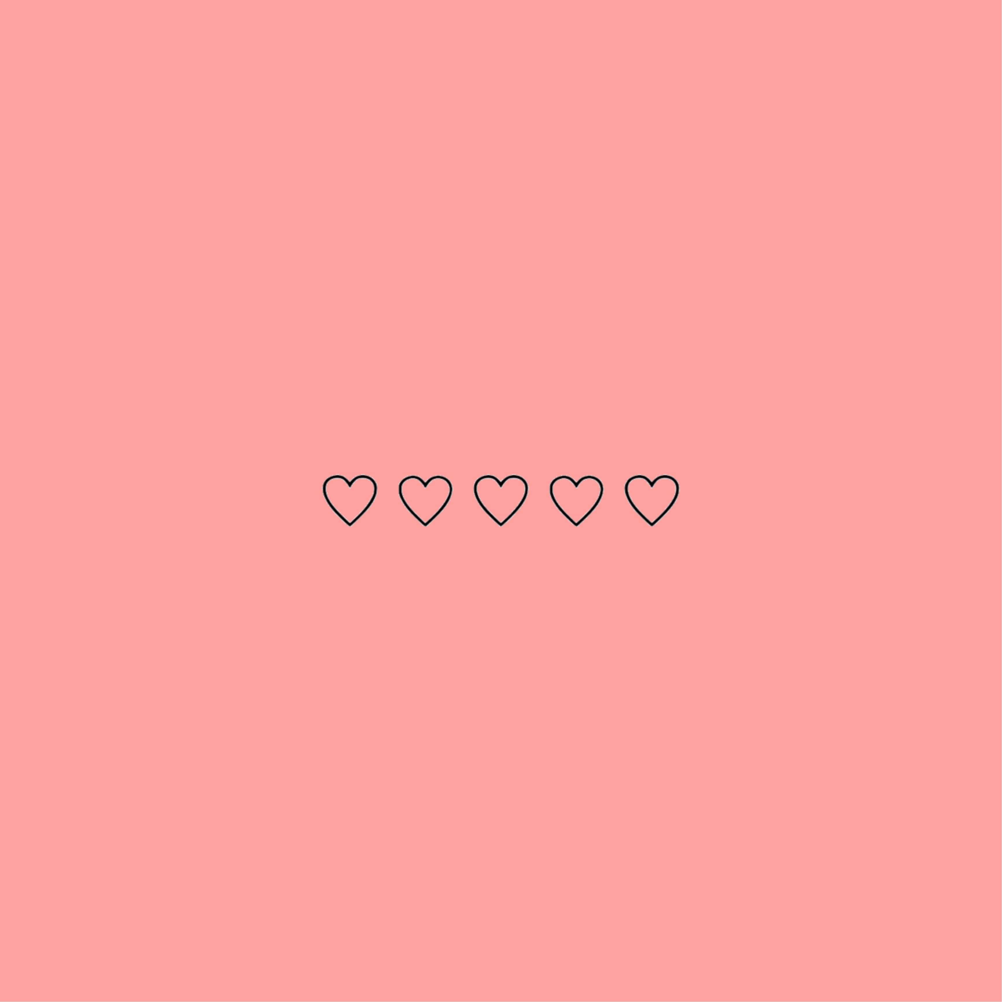 en pink baggrund med hjerter på Wallpapers