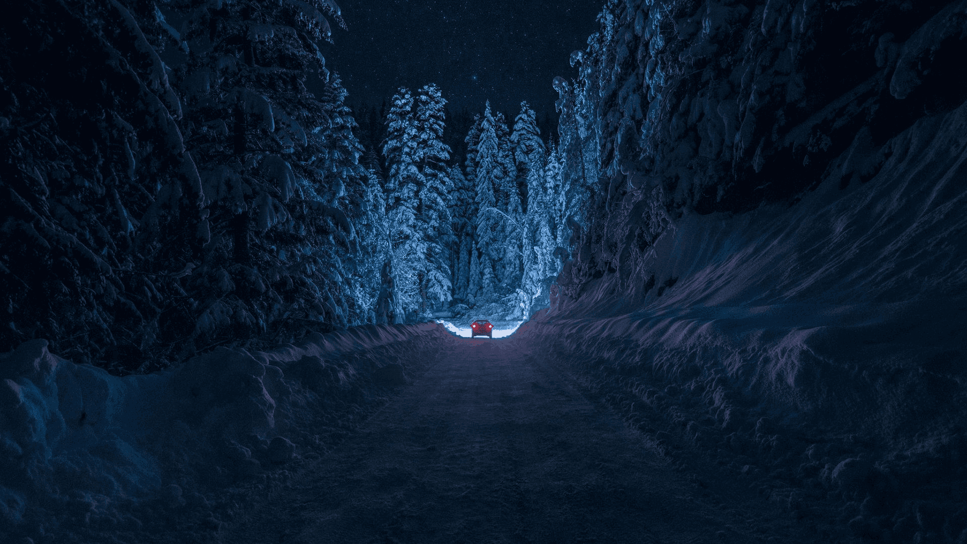 En snevej med et blåt lys i midten Wallpapers