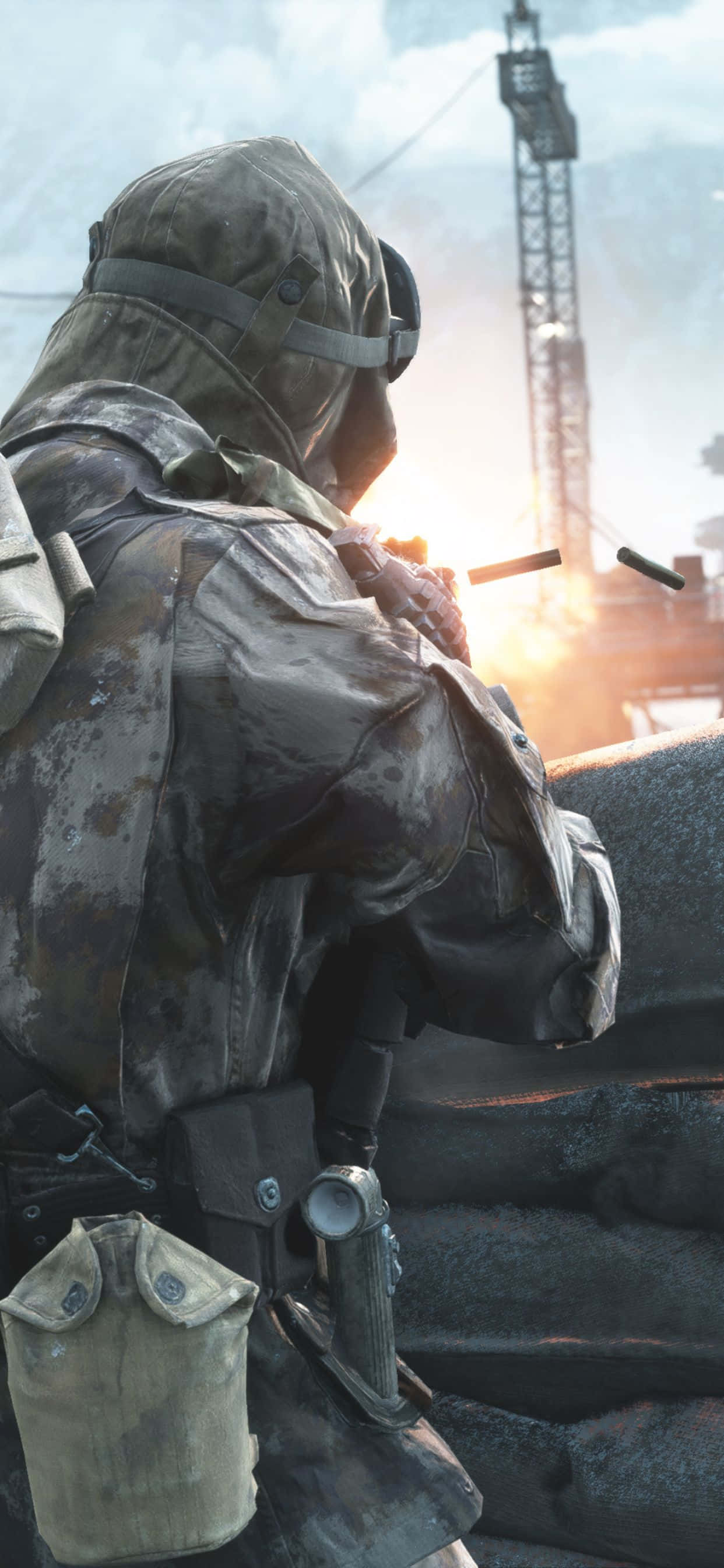 en soldat holder en pistol foran en bygning Wallpapers