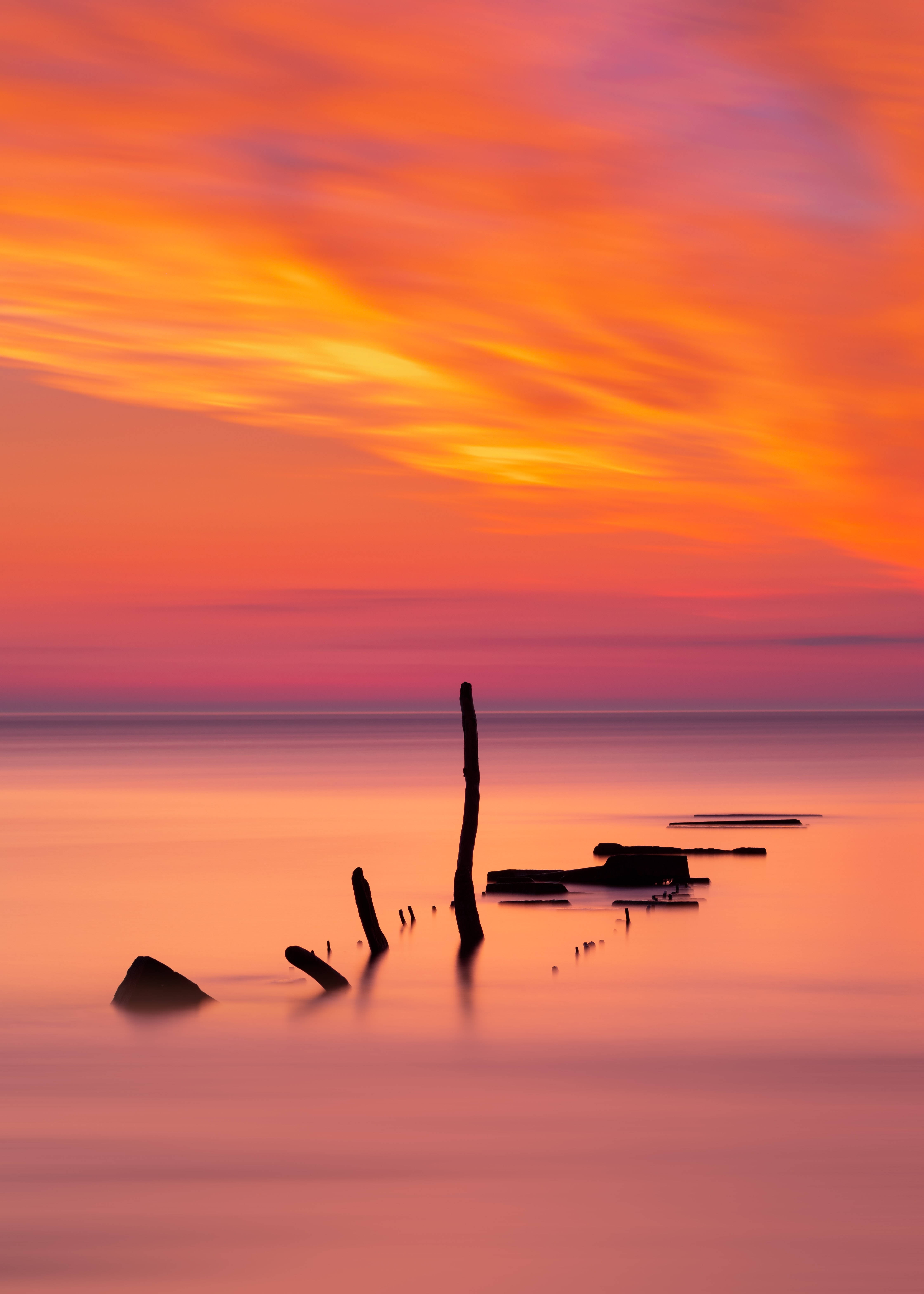 En solnedgang over havet med uendelige horisonter Wallpapers