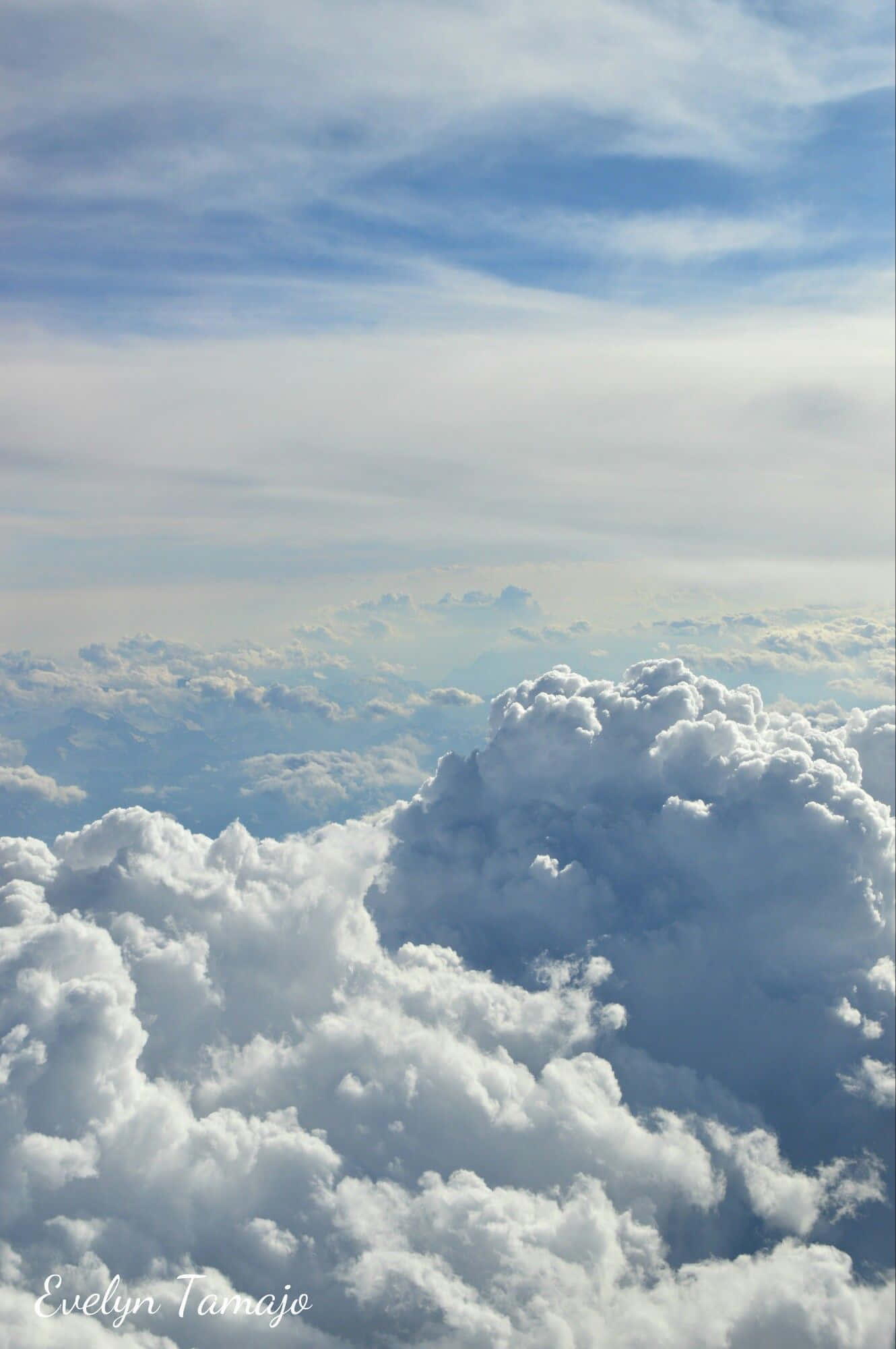 en udsigt over skyer fra et fly Wallpapers
