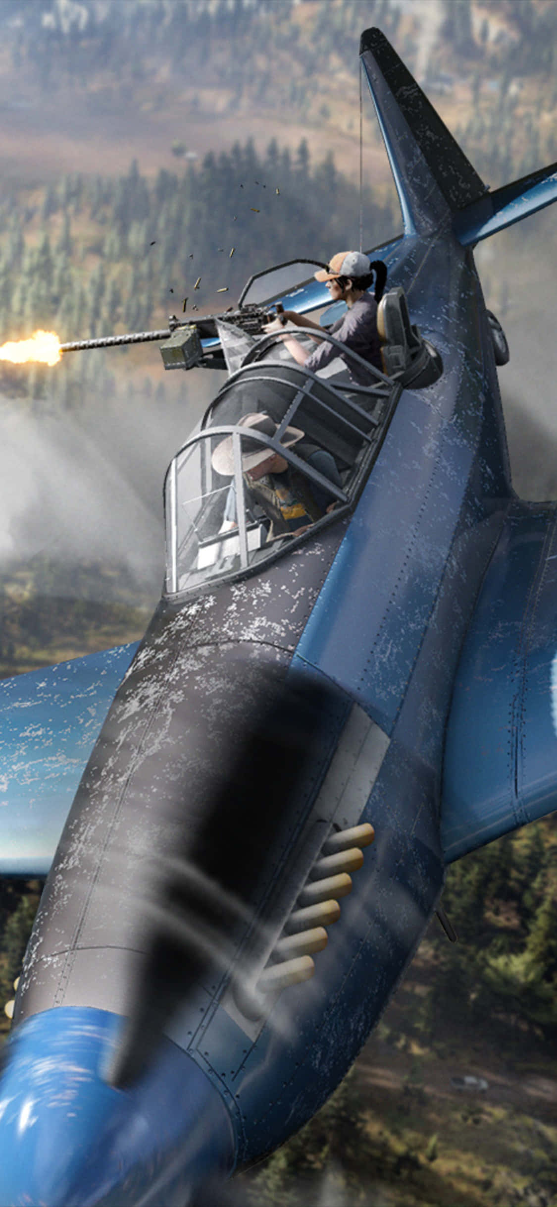 et blåt jetfly flyver over en skov Wallpapers
