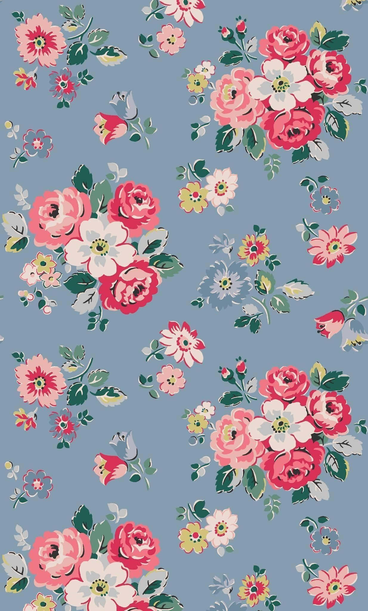 et blomstermønster på en blå baggrund Wallpapers
