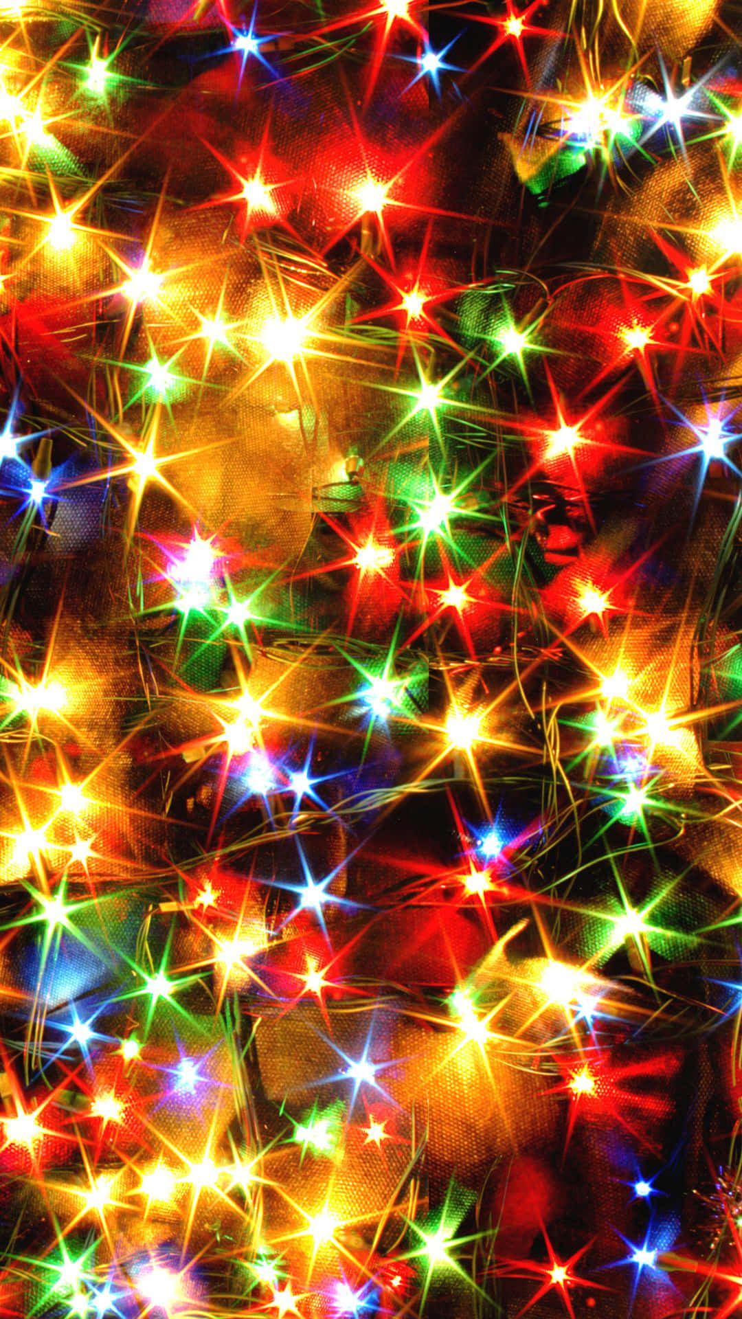 et juletræ med lys på Wallpapers