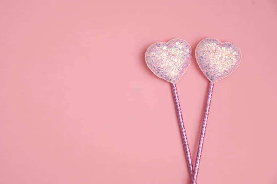 Et lyserødt, glitrende kaskade af hjerteformet konfetti Wallpapers