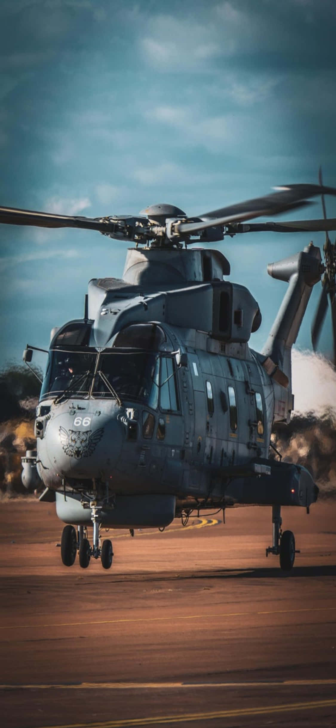 Et udsyn til himlen fra en helikopter, med en iPhone Xs Wallpapers