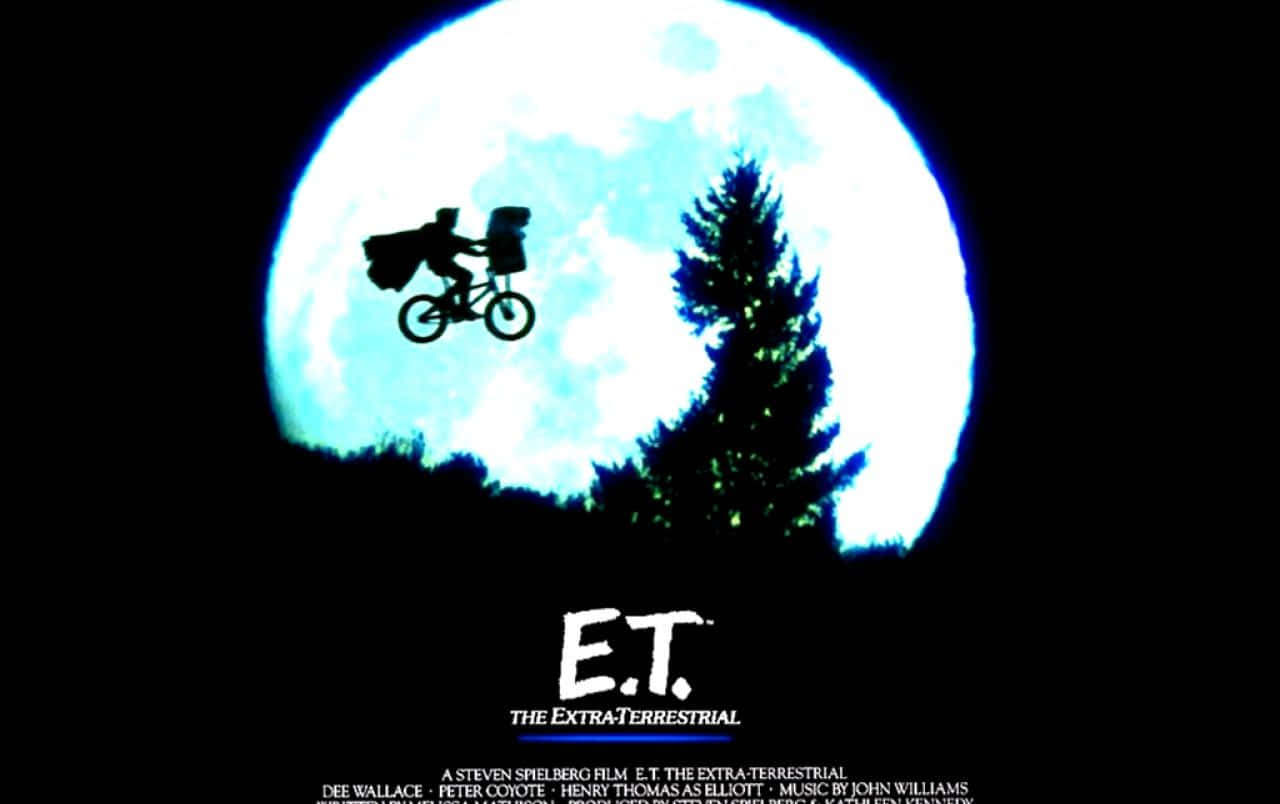 Filmaffisch med en mand, der cykler på himlen Wallpapers