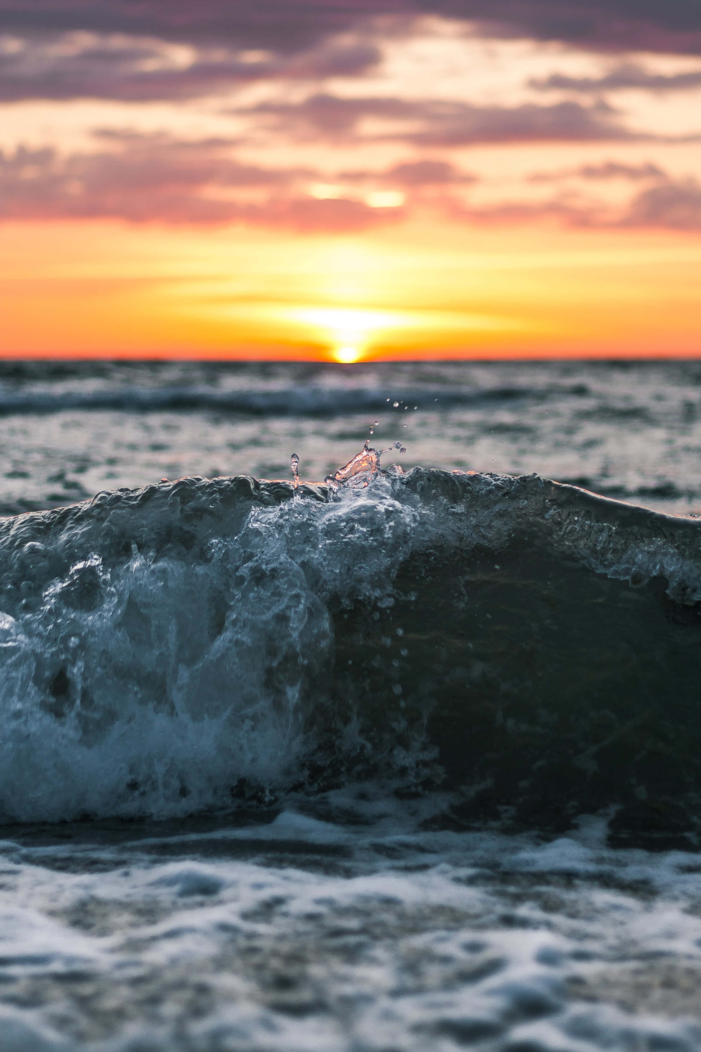 Fængslende Ocean Solnedgang iPhone Baggrund Wallpapers
