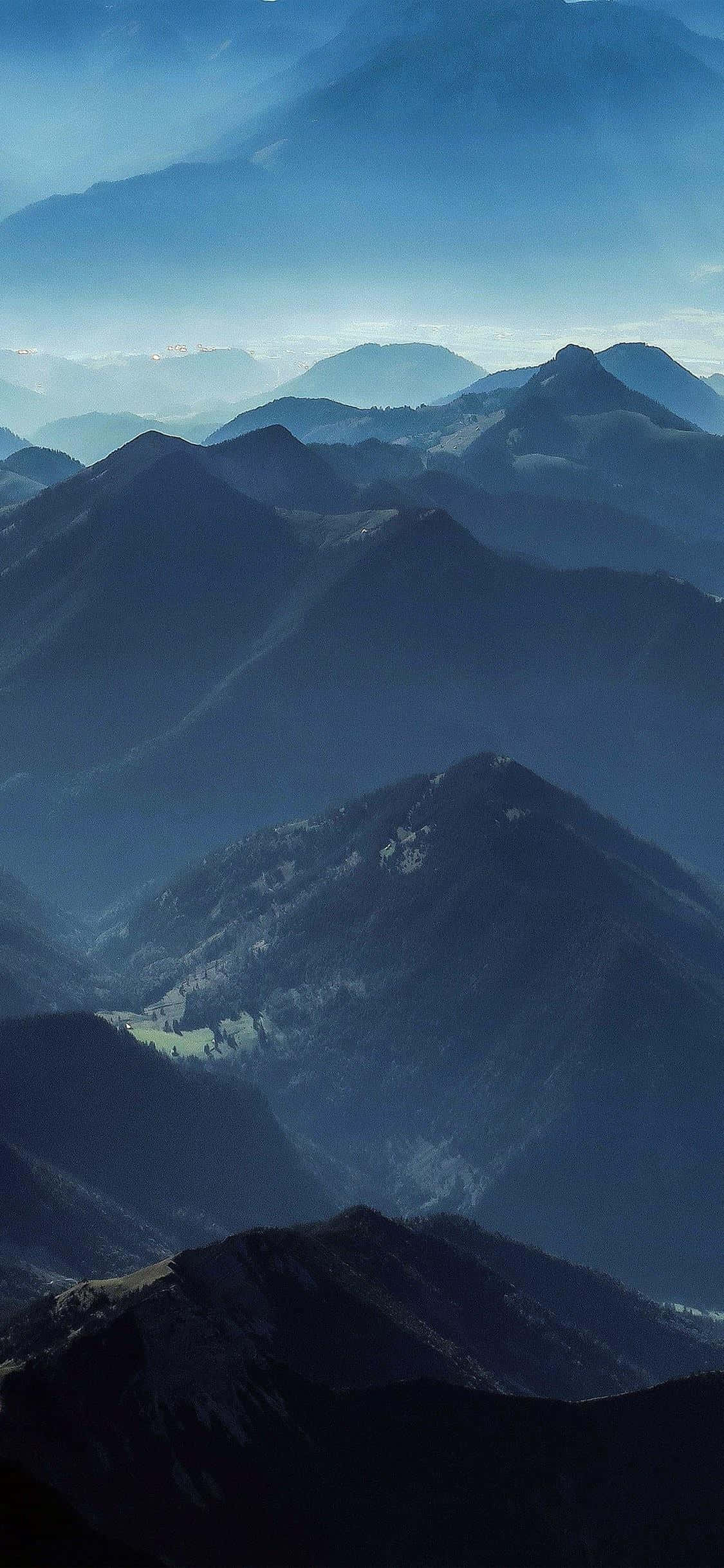 Fredfyldt vandkantslandskab til iPhone X Wallpapers