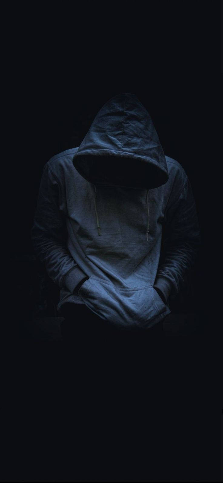 Fyr i hættetrøje med telefon Wallpapers
