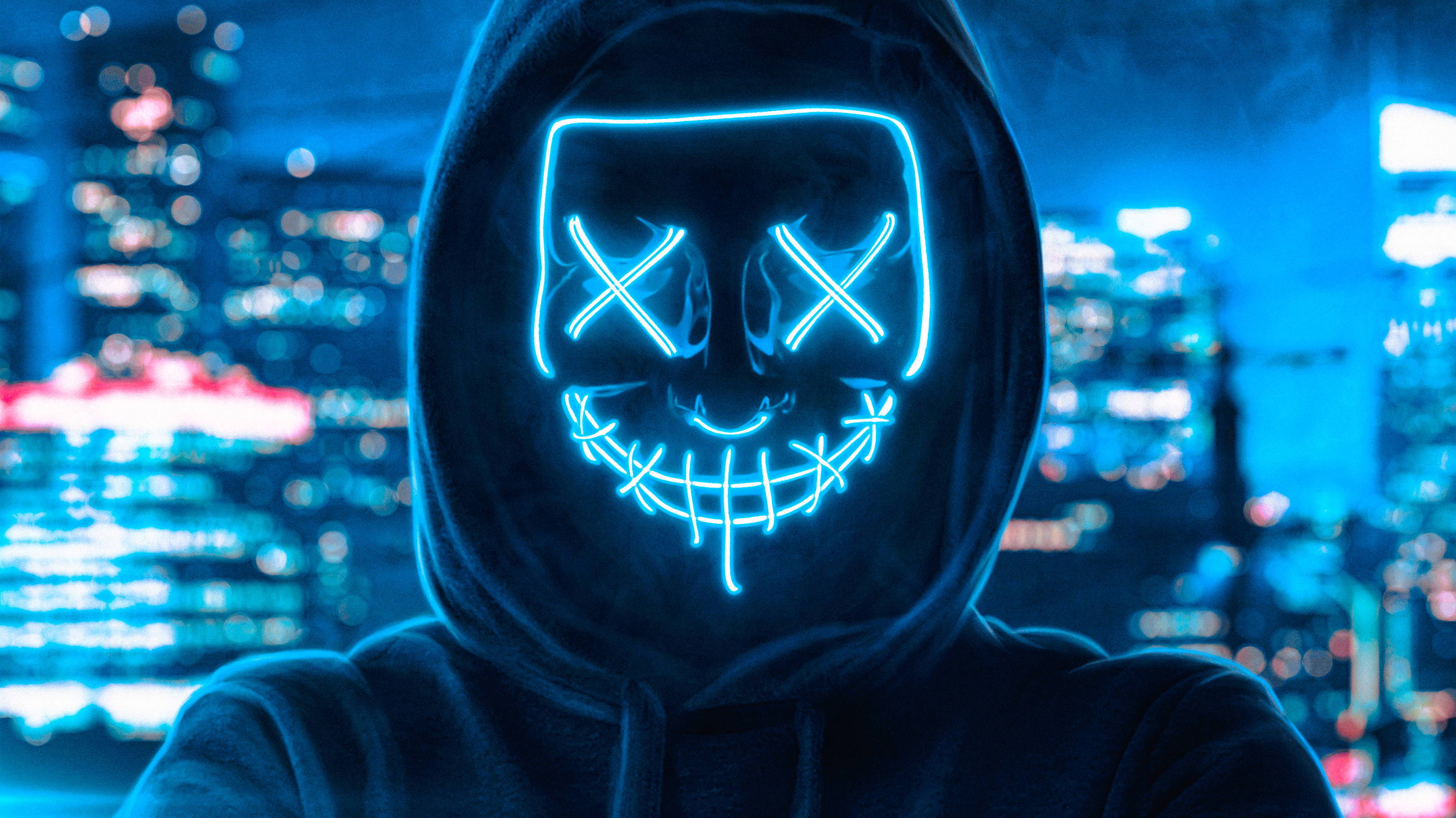 Fyr i neonlysblå purge-maske Wallpapers