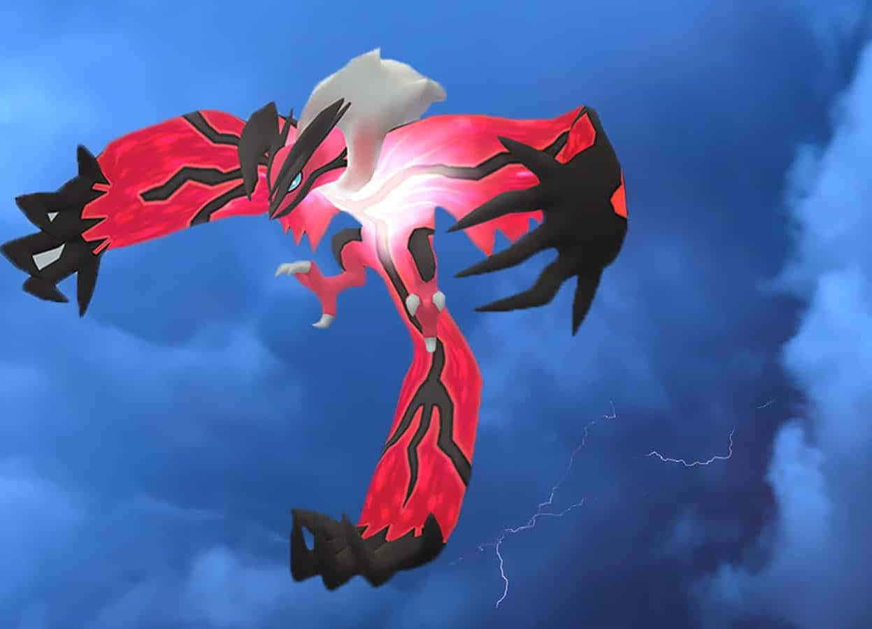 Glødende Yveltal Pokemon på himlen Wallpapers