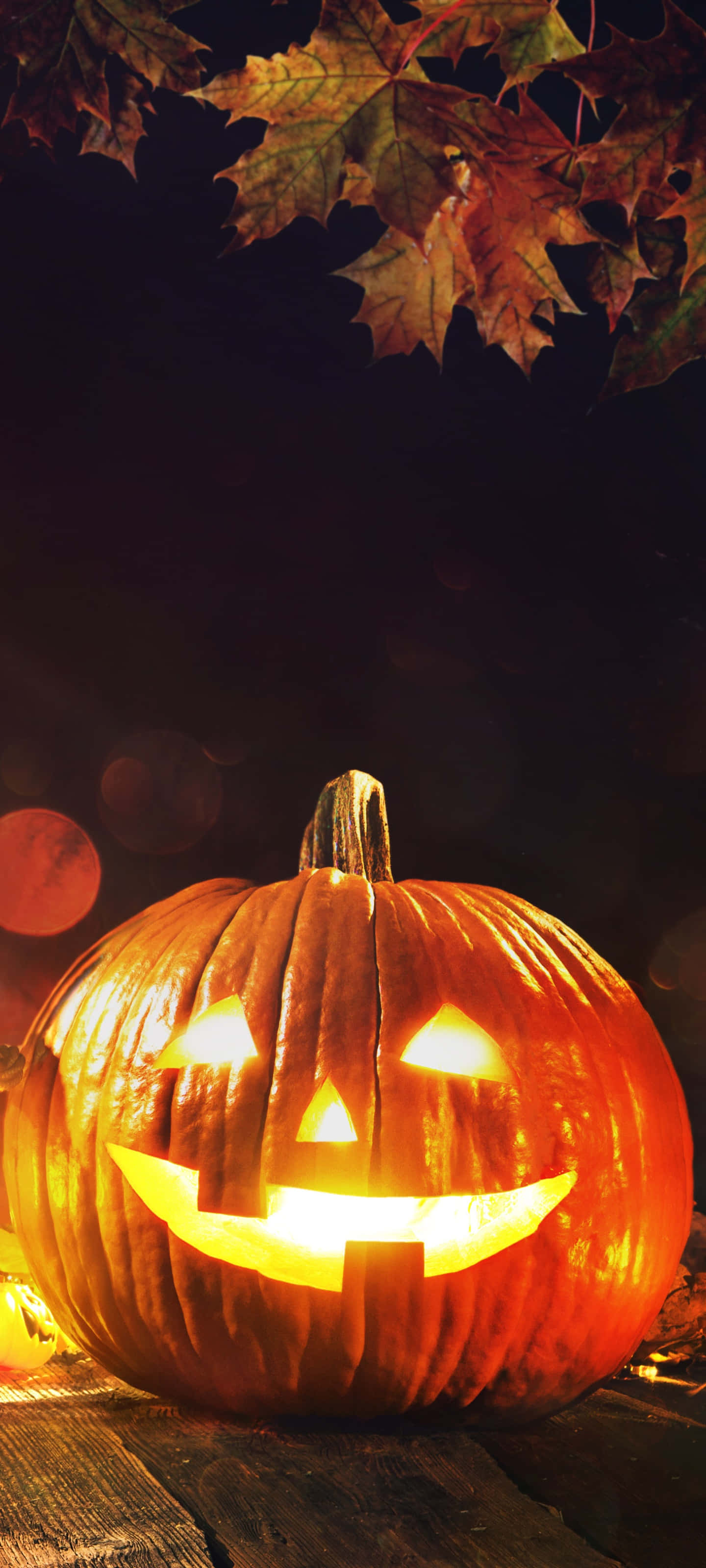 Gør dig klar til uhyggelig sjov med denne Halloween-telefonbaggrund! Wallpapers