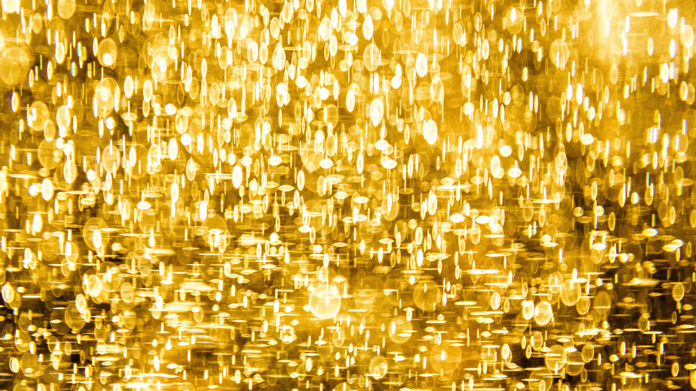 Guldglitter sløret lysbaggrund Wallpapers