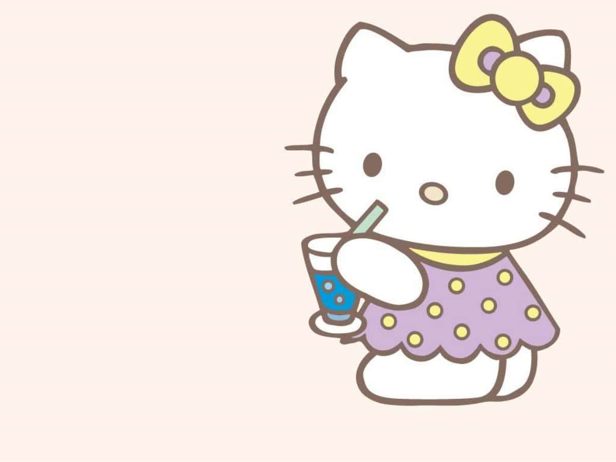 Hello Kitty med drikke ved computer Wallpapers