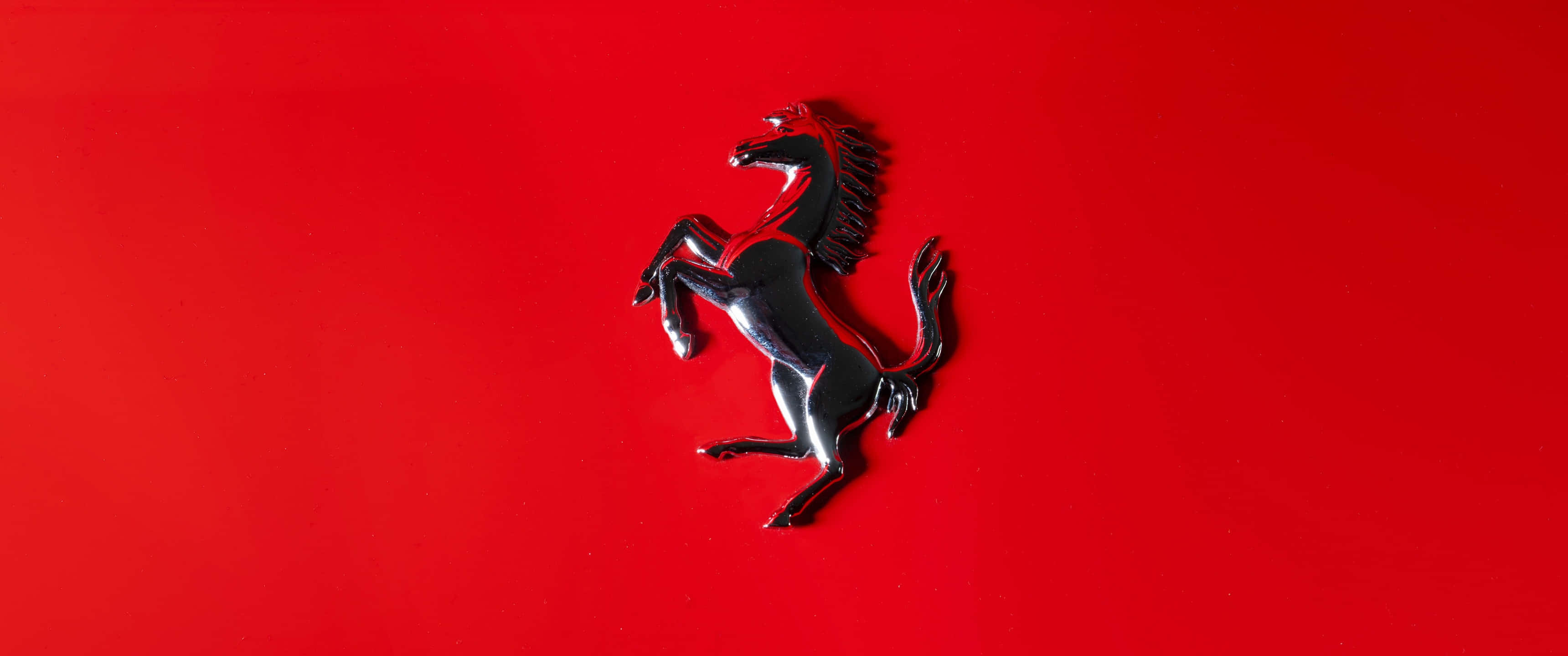 Iøjnefaldende Ferrari bilmærke logo baggrund Wallpapers