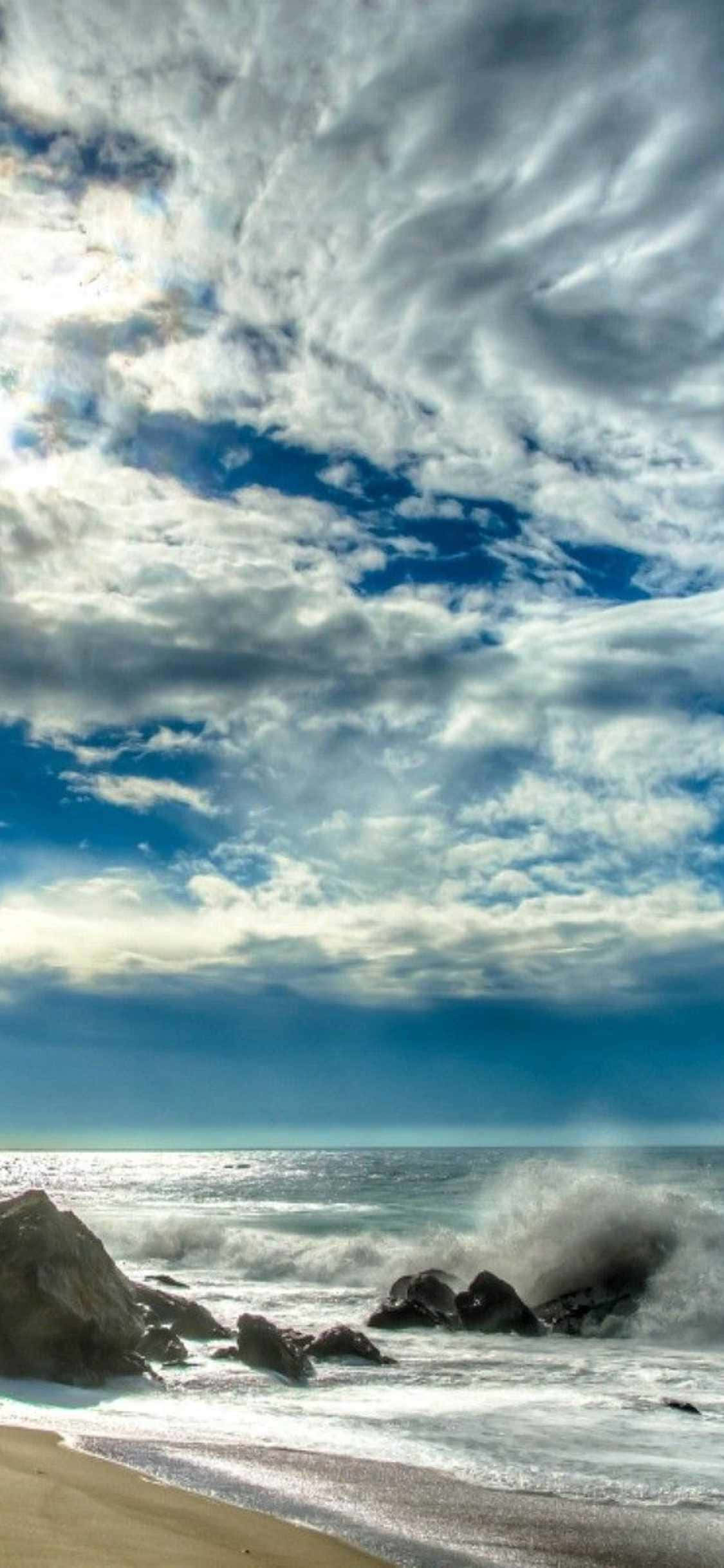 "Fang de gyldne solnedgange i Malibu på din iPhone Xs!" Wallpapers