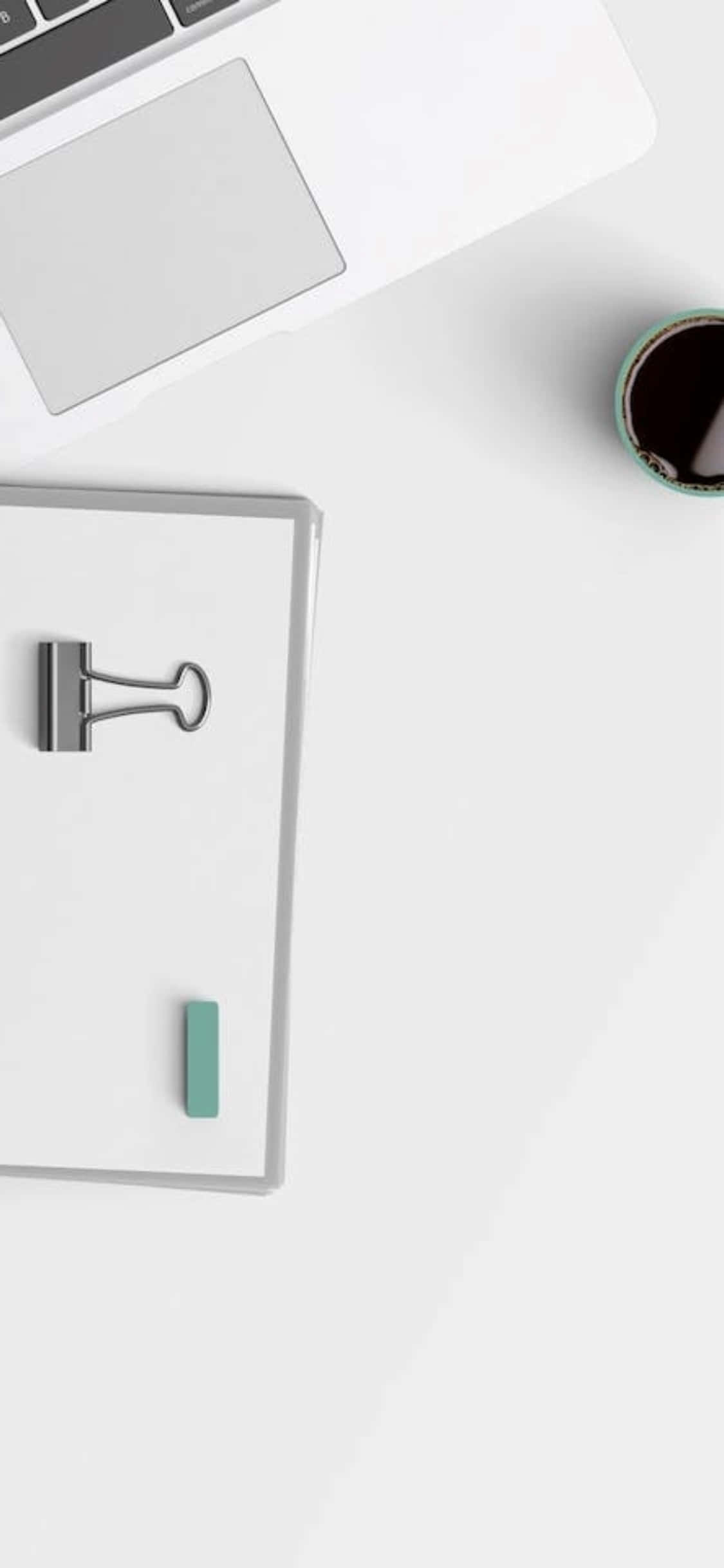 iPhone X skrivebordsbaggrund med clipboard og en bærbar Wallpapers
