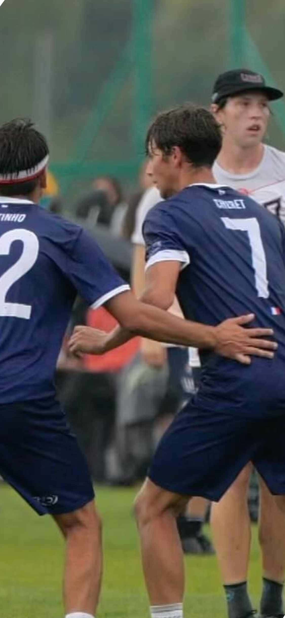 iPhone X Ultimate Frisbee-baggrund med blå uniformer Wallpapers