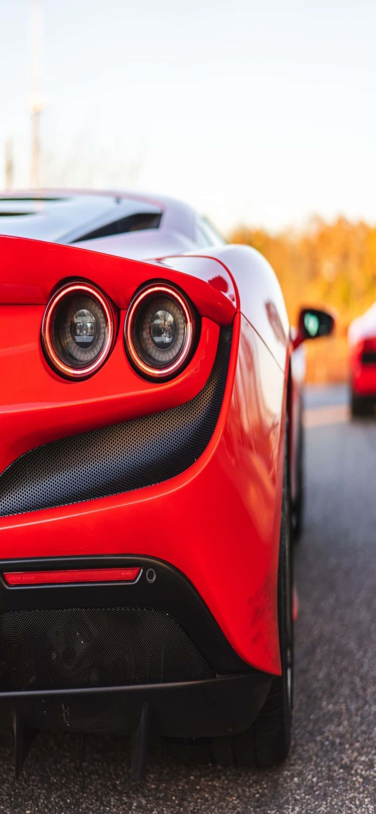 iPhone Xs Max Ferrari Baggrund Bagenden Af En Rød Ferrari F8 Tributo Wallpapers