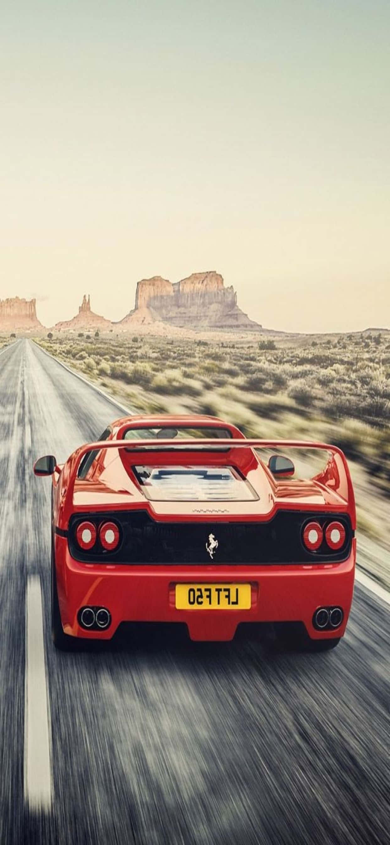 iPhone Xs Max Ferrari Baggrund Rød Ferrari F50 På Vejen Wallpapers