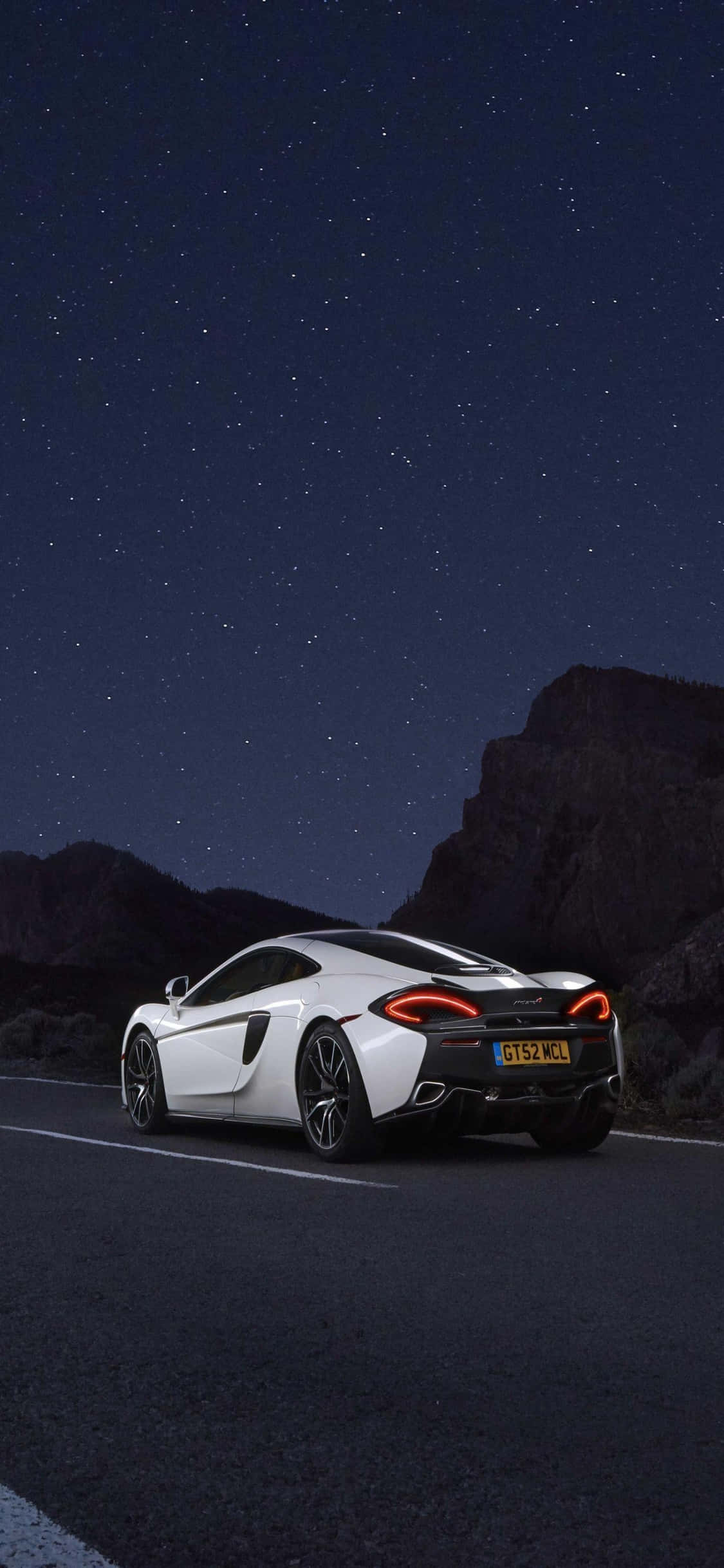 iPhone Xs og Mclaren 720s er den perfekte kombination af kraft og elegance. Wallpapers